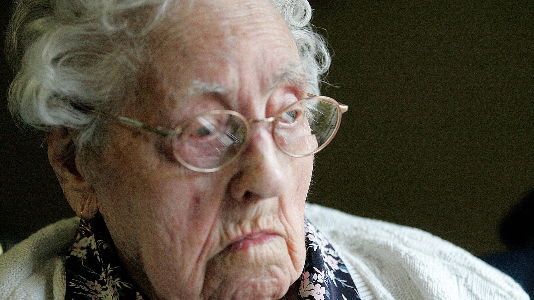 FILE - This file April 2010 photo shows Dina Manfredini of Johnston, Iowa. Manfredini, who inherited the title of world’s oldest person less than two weeks ago, died Monday, Dec. 17, 2012, at age 115, her granddaughter Lori Logli said. She did not elaborate on the cause of her grandmother's death. Manfredini was born on April 4, 1897, in Italy, according to Guinness officials. She moved to the United States in 1920 and settled in Des Moines with her husband. (AP Photo/The Des Moines Register, Lisa Fernandez)
