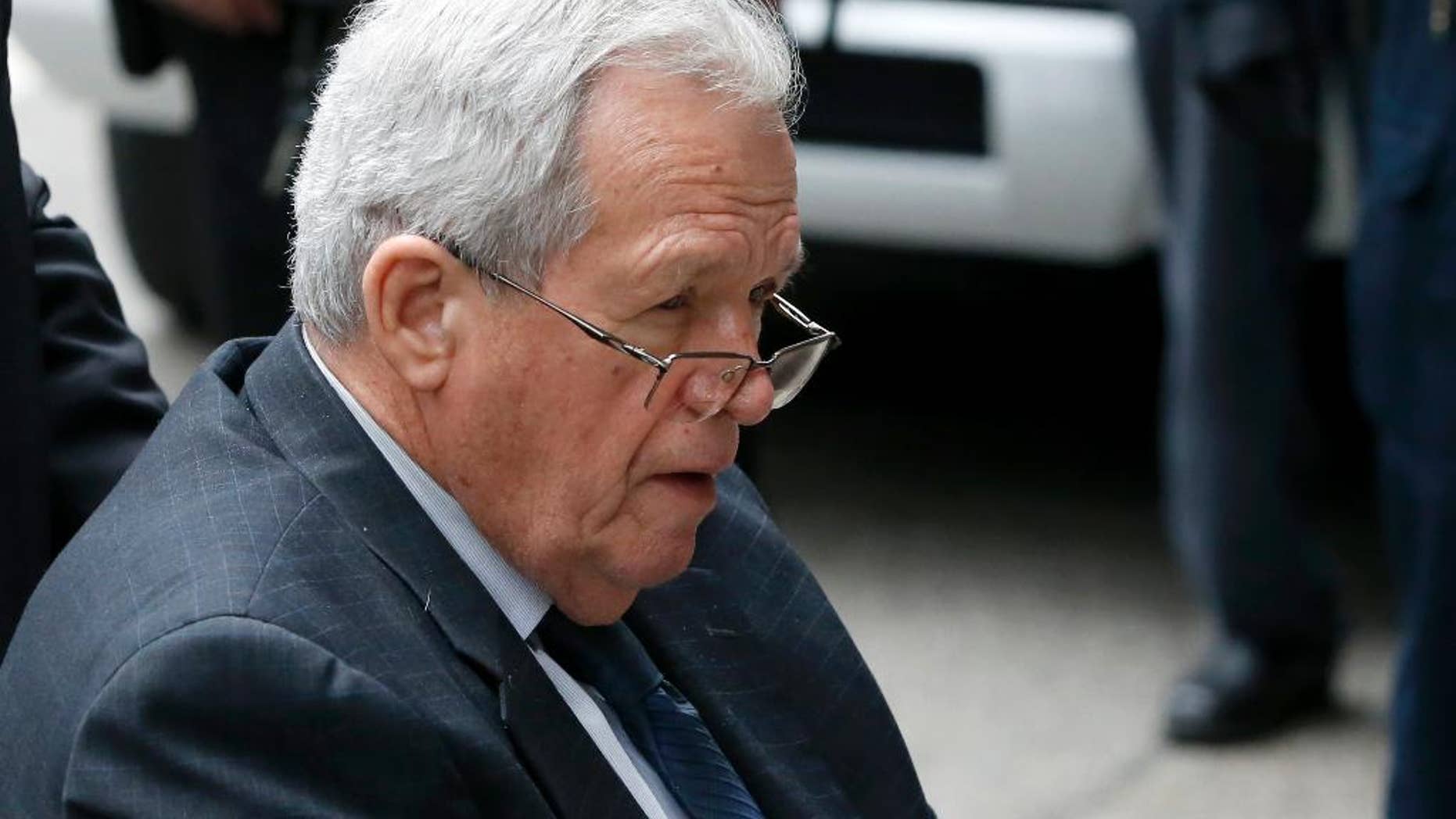 Former House Speaker Dennis Hastert departs the federal courthouse Wednesday, April 27, 2016, in Chicago, after his sentencing on federal banking charges which he pled guilty to last year. Hastert was sentenced to more than a year in prison in the hush-money case that included accusations he sexually abused teenagers while coaching high school wrestling. (AP Photo/Charles Rex Arbogast)
