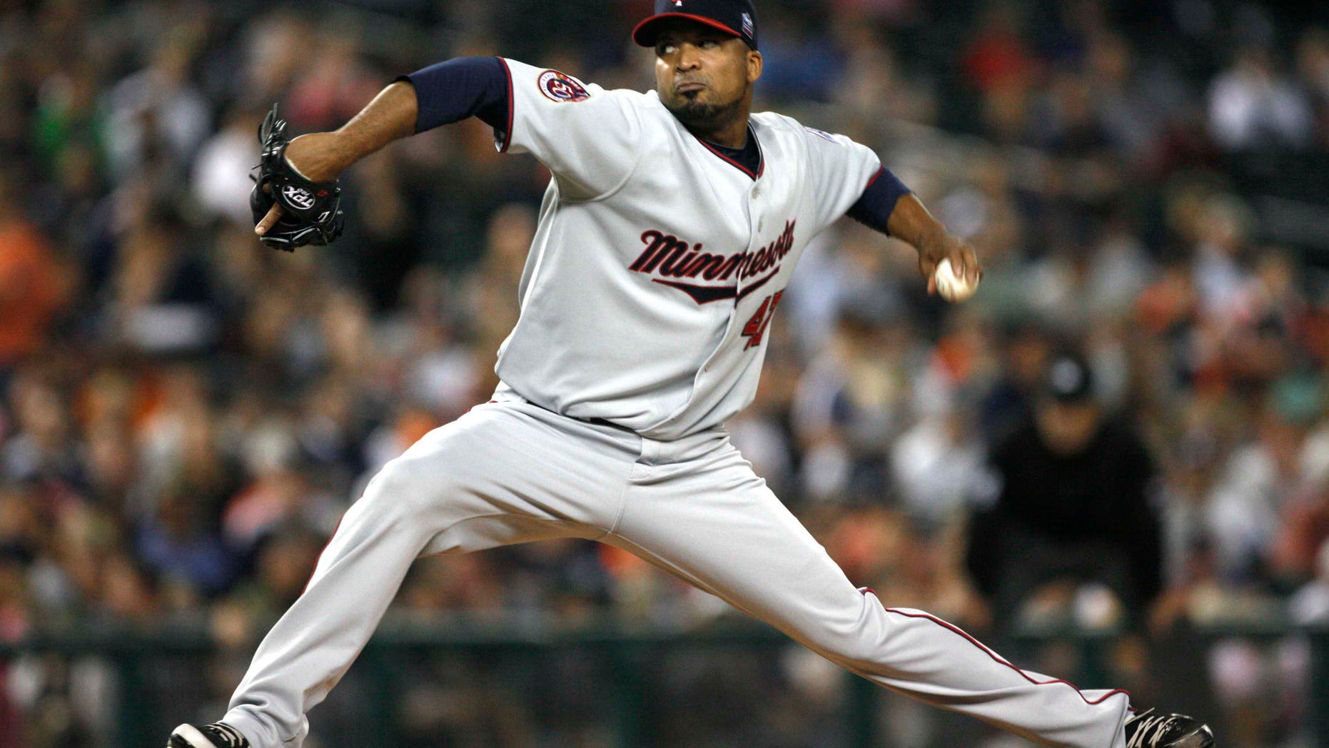 Minnesota Twins pitcher Francisco Liriano throws against the Detroit Tigers in the third inning of a baseball game in Detroit, Friday, Sept. 24, 2010. (AP Photo/Paul Sancya)