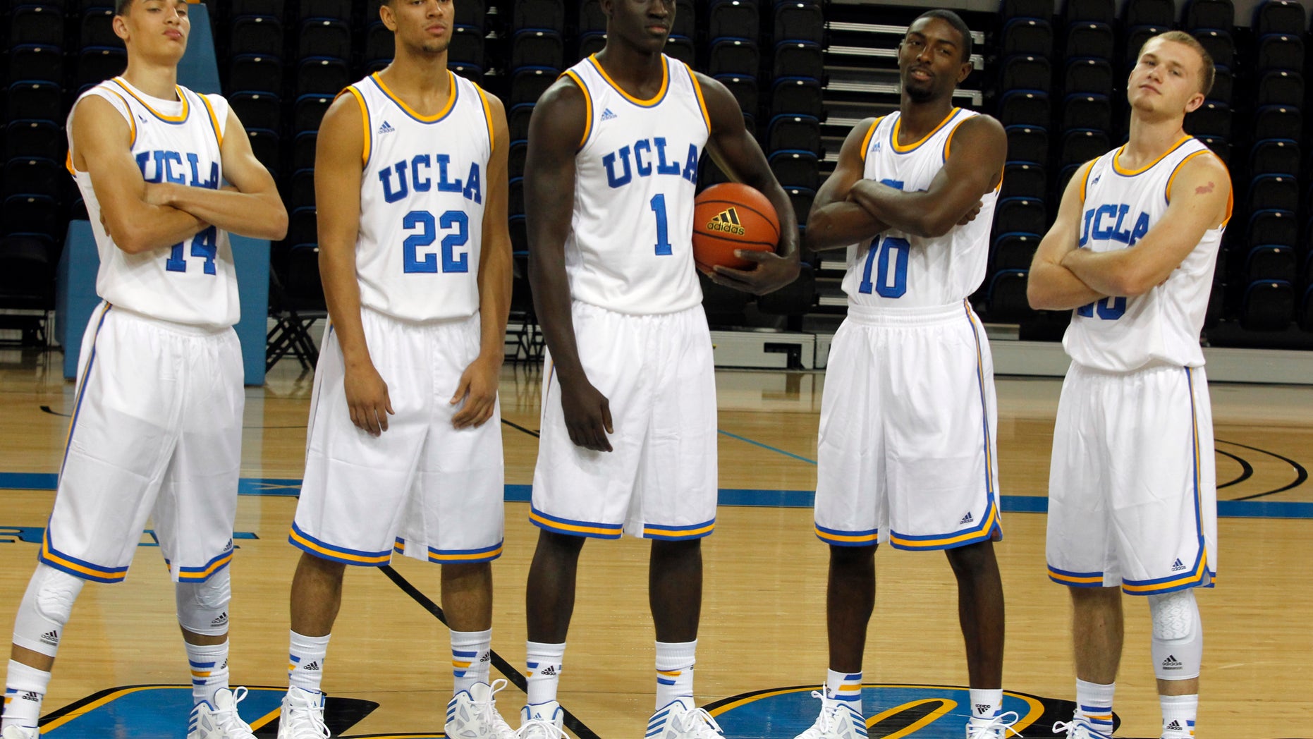 UCLA freshman class from left to right, guard Zach LaVine, forward Noah Allen, forward Wanaah Bail, guard Isaac Hamilton and guard Bryce Alford as they pose for a photo during the NCAA college basketball team's media day, Monday, Oct. 14, 2013, in Los Angeles. (AP Photo/Alex Gallardo)