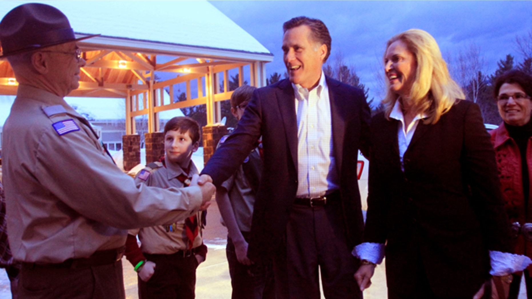 FILE: Former Massachusetts Gov. Mitt Romney and his wife, Ann, are greeted in Bartlett, N.H. on March 5.