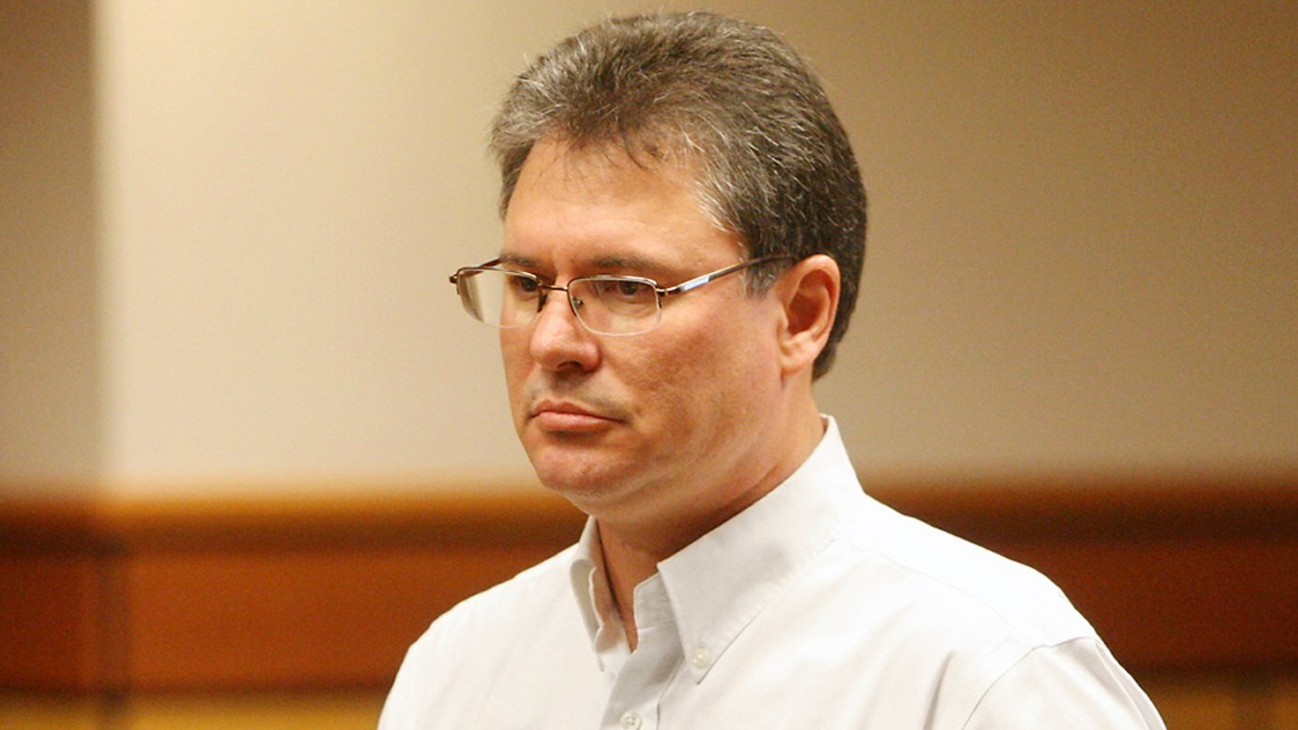 FILE - This Aug. 26, 2013 photo shows Stacey Rambold standing in a courtroom after sentencing by Judge G. Todd Baugh in Billings, Mont. The state is due, Nov. 25, 2013, to file arguments in its appeal of a 30-day sentence given to Rambold, a Montana teacher who raped a freshman student. The student later killed herself, and the judge who showed rapist Rambold leniency sparked widespread outrage when he said she was "older than her chronological age." (AP Photo/Billings Gazette, Paul Ruhter, file)