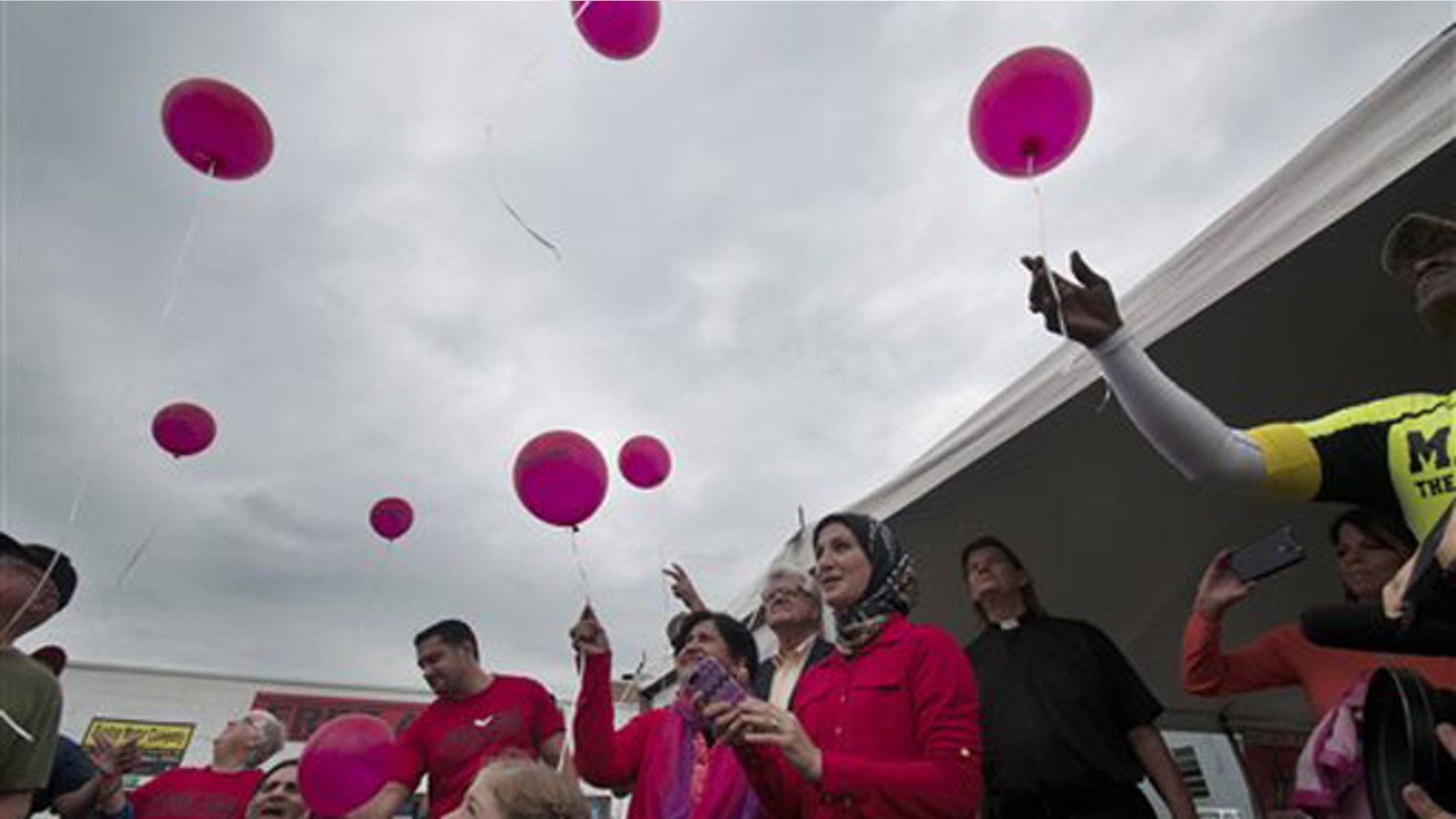 Aug. 29, 2015: Balloons are released during a rally for Amir Hekmati in Bay City, Mich., to mark the four-year anniversary of Iran's refusal to free the former U.S. Marine from prison.