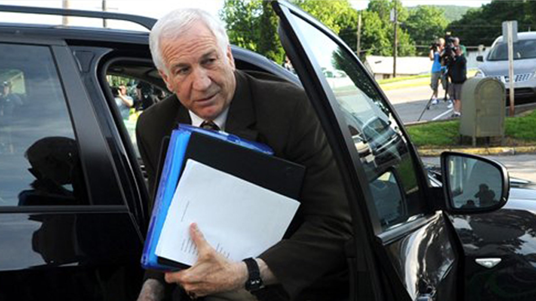 June 14, 2012: Former Penn State University assistant football coach Jerry Sandusky arrives for the fourth day of his trial at the Centre County Courthouse in Bellefonte, Pa.