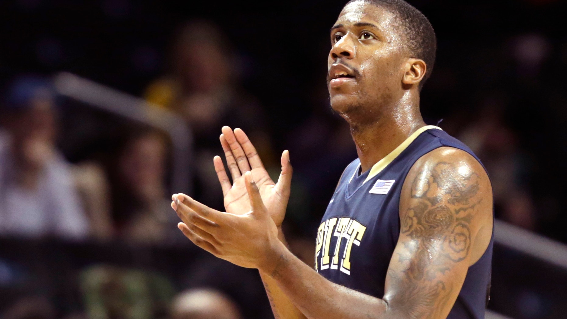 Pittsburgh guard/forward Lamar Patterson (21) applauds as he is taken out of the game in the second half of an NCAA college basketball game against Stanford in the Legends Classic championship game, Tuesday, Nov. 26, 2013, in New York. Pittsburgh won 88-67. (AP Photo/Kathy Willens)