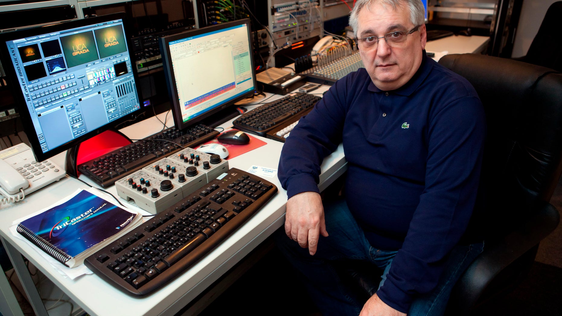 In this March 24, 2011 photo, former AP Dubrovnik video stringer Dragan Banovic sits at the editing desk at a local TV station in Dubrovnik, Croatia. Dragan Banovic passed away Wednesday May 29, 2013 after battling cancer. Banovic, a long-time Associated Press Television News stringer who covered a series of wars that erupted after the dissolution of Yugoslavia, has died. He was 60. Banovic was based in the Croatian coastal city of Dubrovnik and has covered its siege by Serbian and Montenegrin forces for the local Croatian channel HRT in 1991. He worked for Associated Press Television from 1994 and has covered the war in Bosnia, Kosovo and the NATO bombing of Yugoslavia. (AP Photo/Grgo Jelavic/Pixsell)