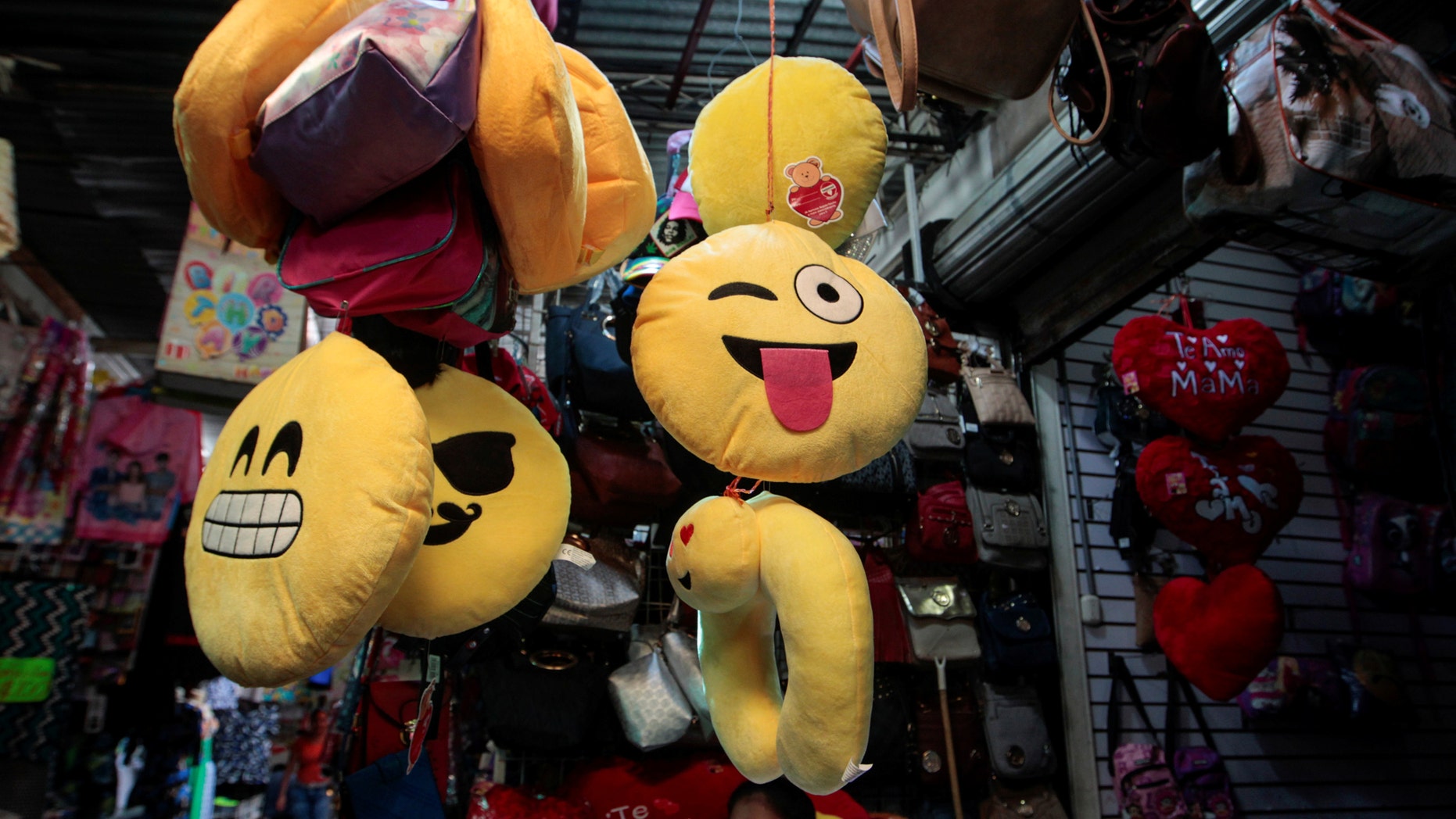 File photo: A woman sells emoji cushions at the Oriental market in Managua, Nicaragua, May 19,2017. (REUTERS/Oswaldo Rivas)