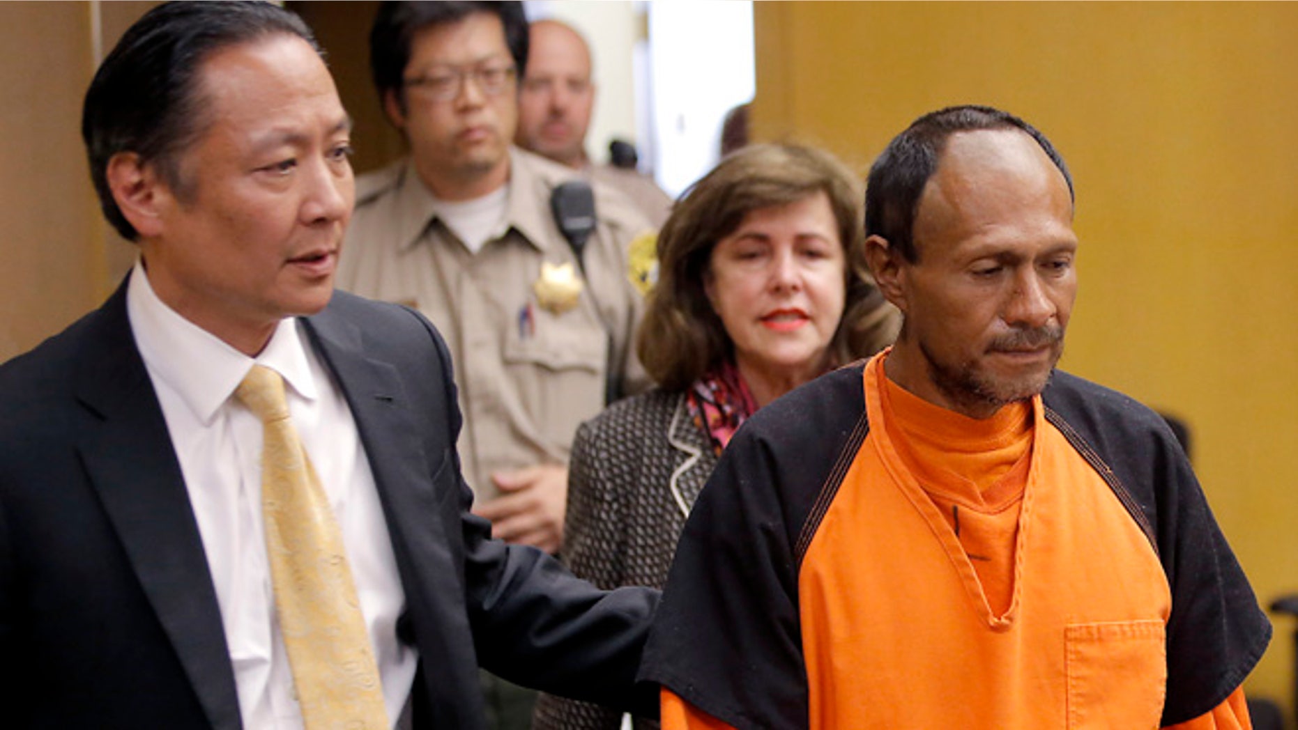 July 7, 2015: Francisco Sanchez, right, is lead into the courtroom for his arraignment at the Hall of Justice in San Francisco. He is accused of killing Kate Steinle, despite having been in police custody and ICE not having been notified of his release. (AP)