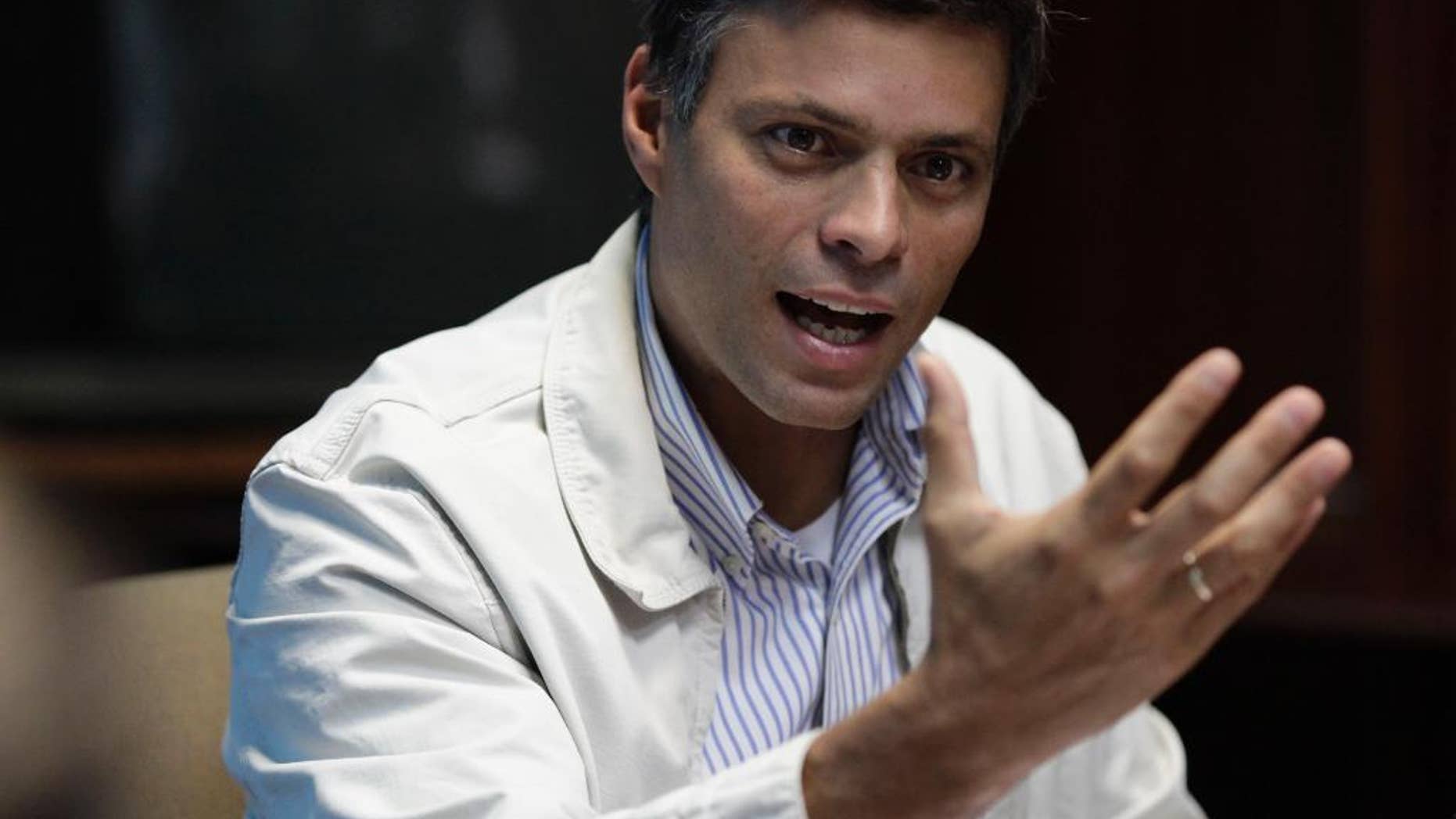 FILE - In this Feb. 26, 2013 file photo, Opposition leader Leopoldo Lopez speaks during a press conference in Caracas, Venezuela. A Venezuelan appeals court upheld on Friday, Aug. 12, 2016 the nearly 14-year prison sentence given to Lopez for inciting violence during anti-government protests in 2014, his lawyer said. (AP Photo/Ariana Cubillos, File)