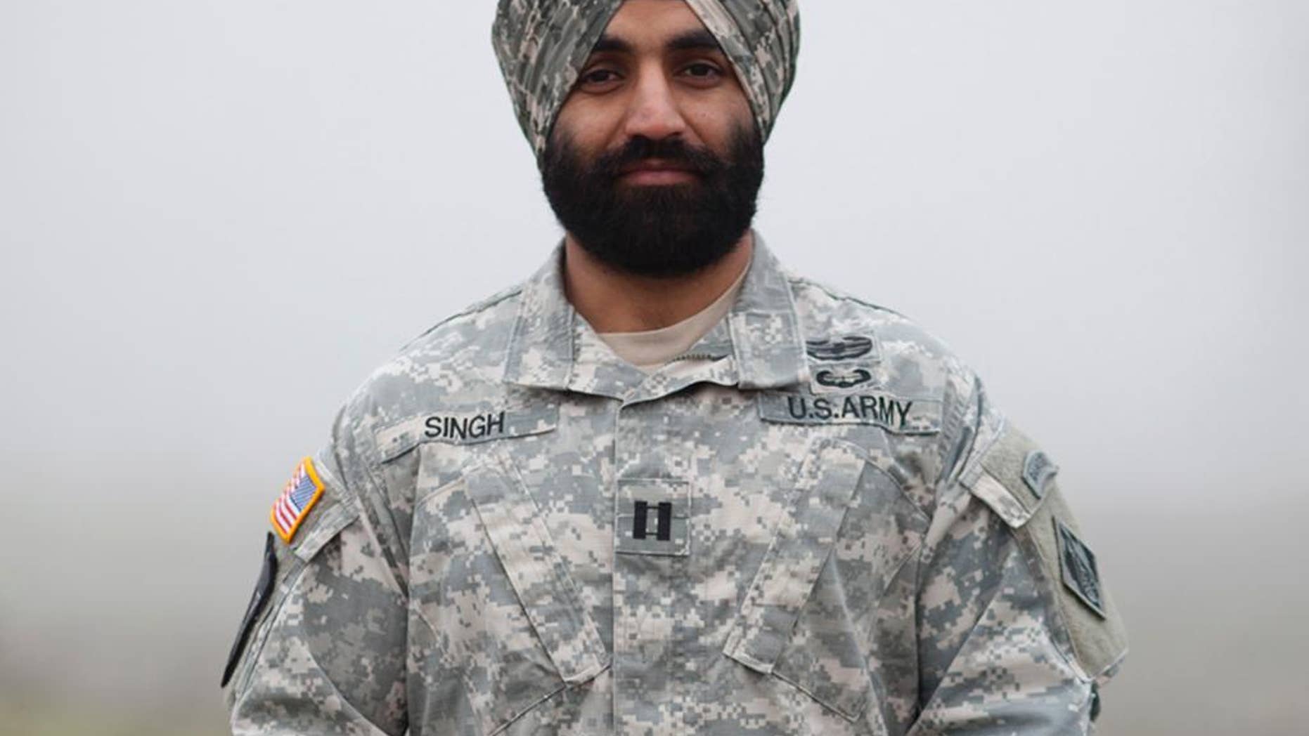 This photo provided by the Sikh Coalition shows Army Capt. Simratpal Singh. When Singh entered the U.S. Military Academy at West Point back in 2006, he did something he thought he would never have to: shave his beard. "One of the hardest things I had to do was look in the mirror every day and shave," said Singh, whose Sikh religion requires men to grow beards as an article of faith. Now Singh and three Army enlistees have won permission to wear beards and turbans after filing federal lawsuits that seek to force the Pentagon to accommodate those who wear beards for religious reasons. Singh, won an administrative exception under an Army policy that allows exemptions to the no-beard policy on a case-by-case basis. (Jovelle Tamayo/Sikh Coalition via AP)