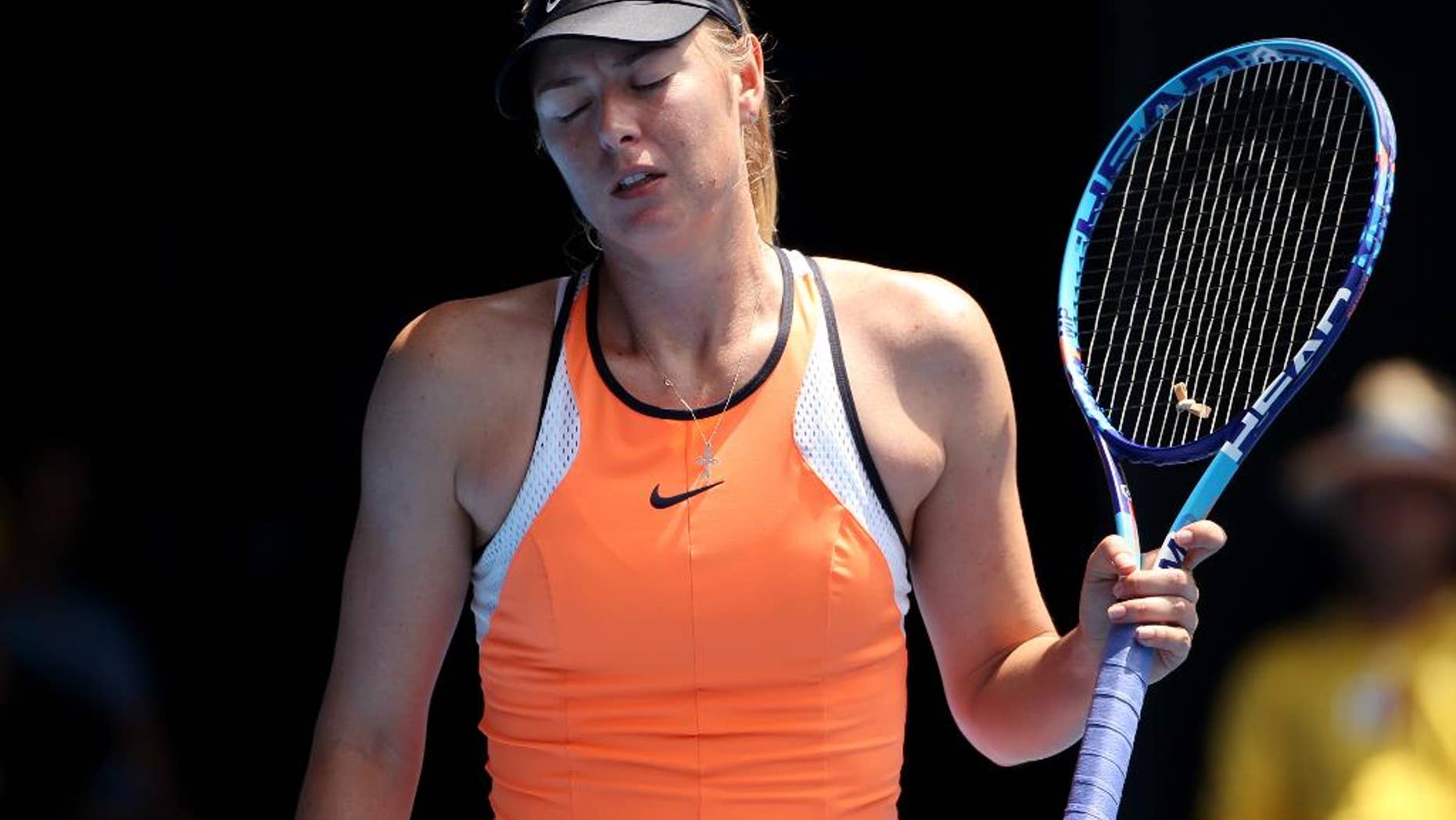 FILE - In this Tuesday, Jan. 26, 2016 file photo, Maria Sharapova of Russia loses a point to Serena Williams of the United States during their quarterfinal match at the Australian Open tennis championships in Melbourne, Australia. Maria Sharapova has appealed her two-year doping ban, Tuesday June 14, 2016, to the highest court in sports, seeking a ruling ahead of the Olympics in Rio de Janeiro (AP Photo/Rick Rycroft, File)
