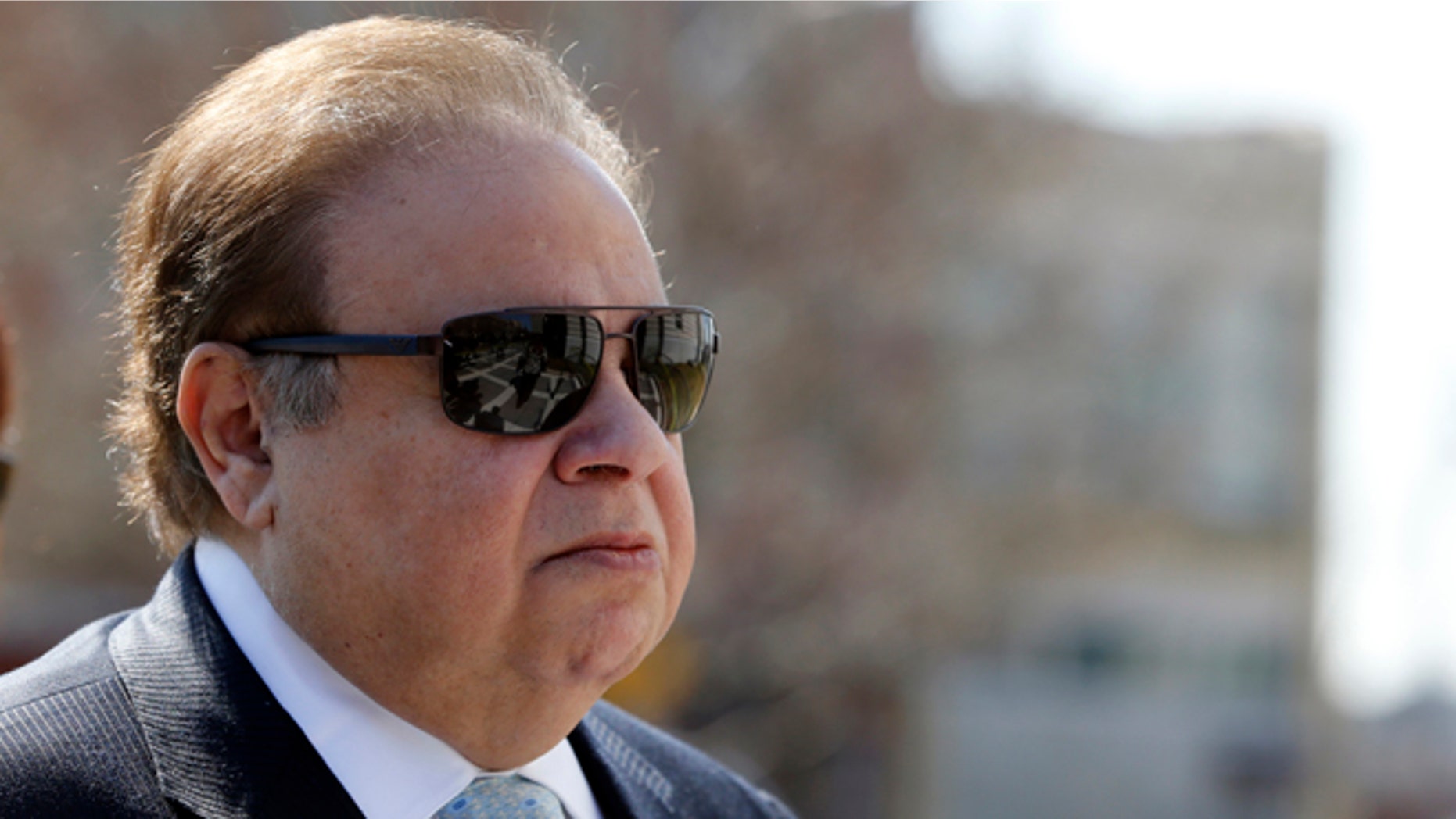 Dr. Salomon Melgen arrives at a Federal Courthouse for his arraignment in Newark, N.J., on April 2, 2015.