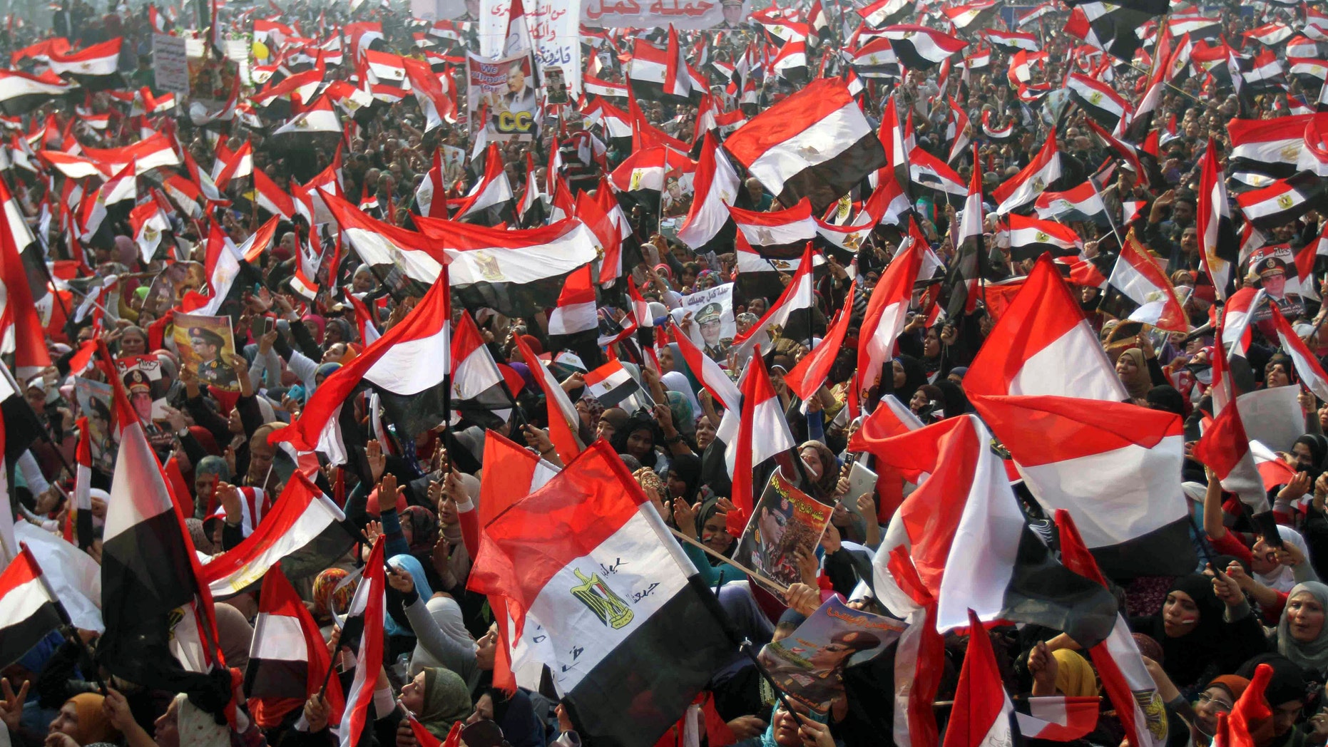 Jan. 25, 2014: Supporters of Egypt';s army and police gather at Tahrir square in Cairo, on the third anniversary of Egypt's uprising.