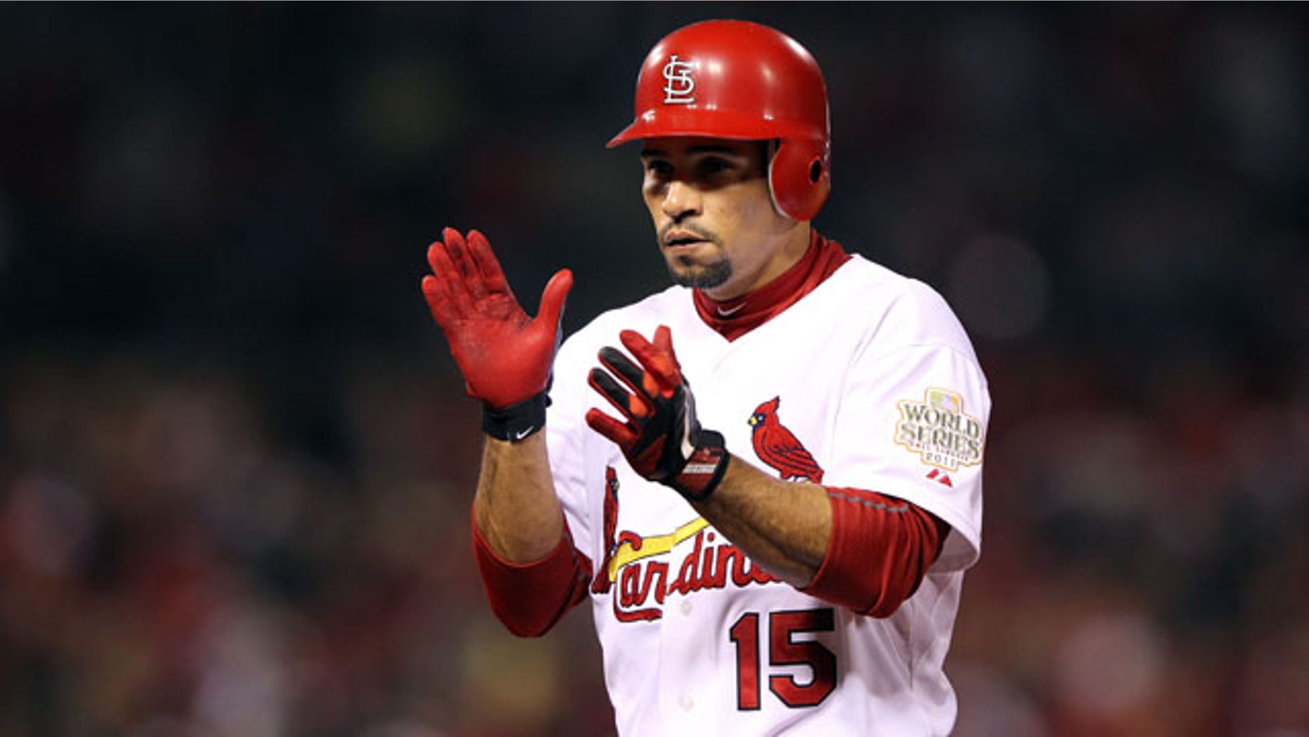 ST LOUIS, MO - OCTOBER 28: Rafael Furcal #15 of the St. Louis Cardinals celebrates after hitting a single in the second inning during Game Seven of the MLB World Series against the Texas Rangers at Busch Stadium on October 28, 2011 in St Louis, Missouri. (Photo by Jamie Squire/Getty Images)