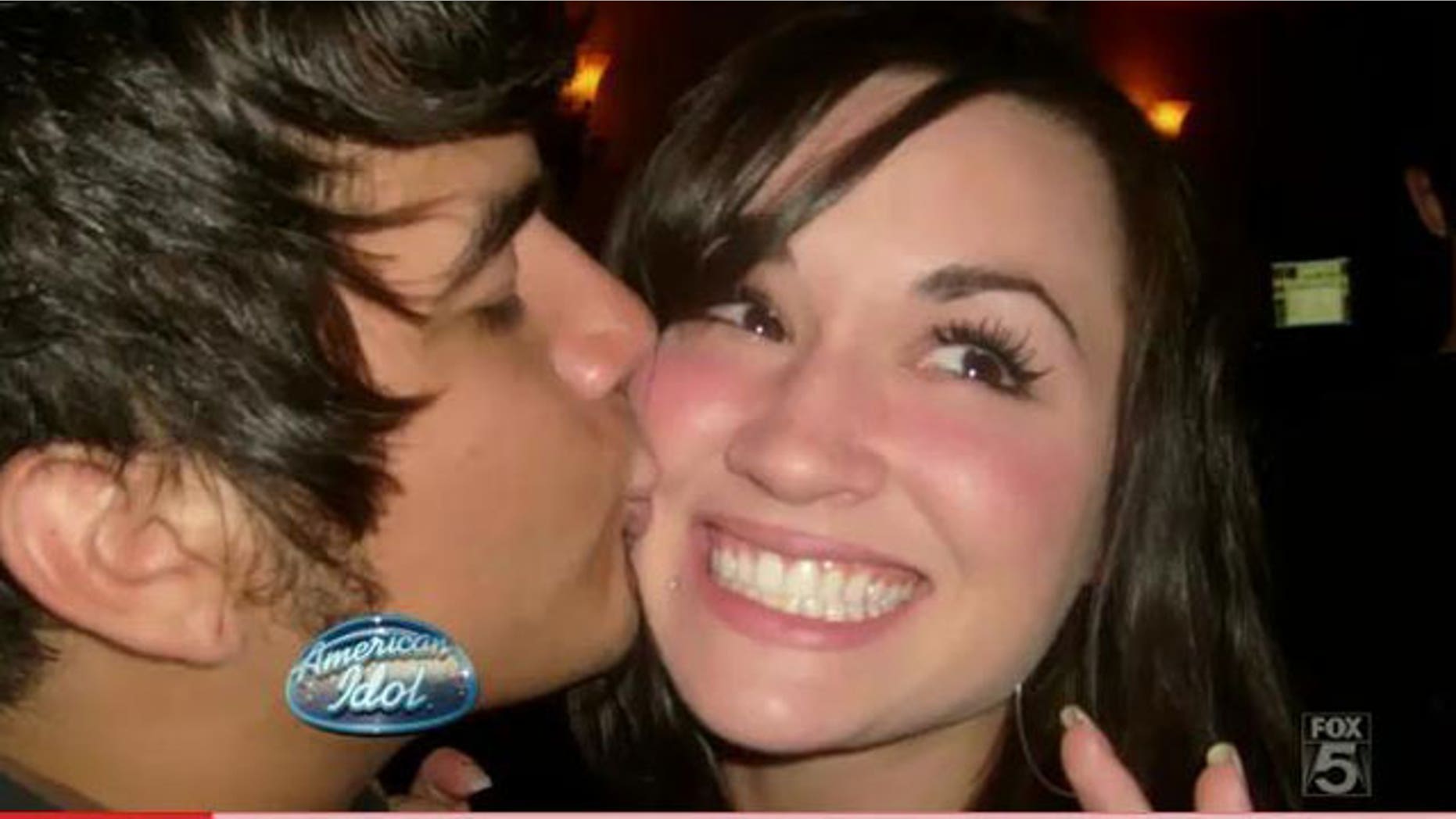 "Idol" hopeful Chris Medina and his fiancee Juliana Ramos before an accident left her brain-damaged. (Fox)