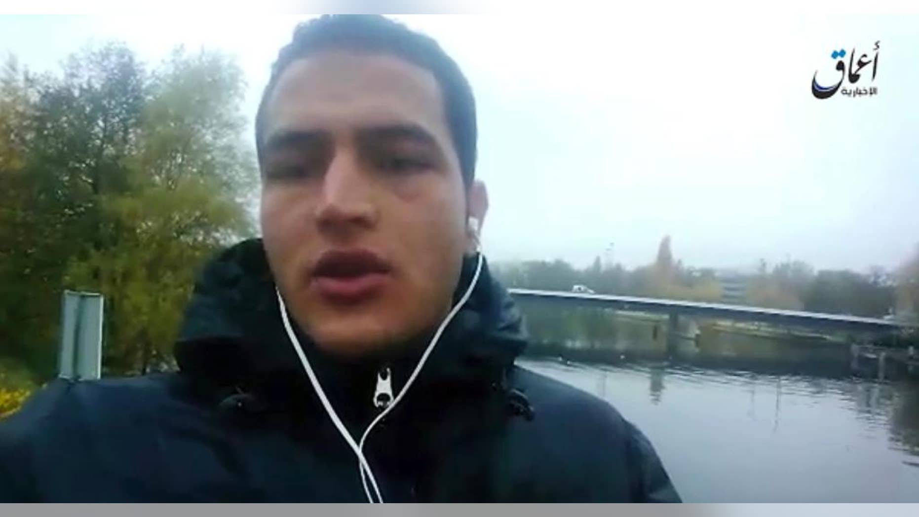 Dec. 23, 2016: This image made from video released by ISIS, shows Anis Amri, a Tunisian suspect in the Berlin truck attack, pledging allegiance to its leader Abu Bakr al-Baghdadi and vowing to fight against what he calls "the Crusader pigs."