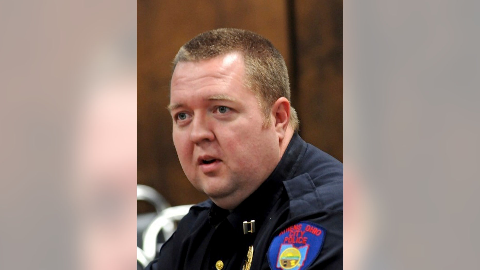 A Jan. 2011 photo shows Athens City Police Chief Tom Pyle in Athens, Ohio. Pyle said Tuesday, Oct. 15, 2013, that photos taken of an alleged rape Sunday, Oct. 13, 2013, may seem despicable to the average person but are also helping police in their investigation. (AP Photo/Athens Messenger, John Halley) (