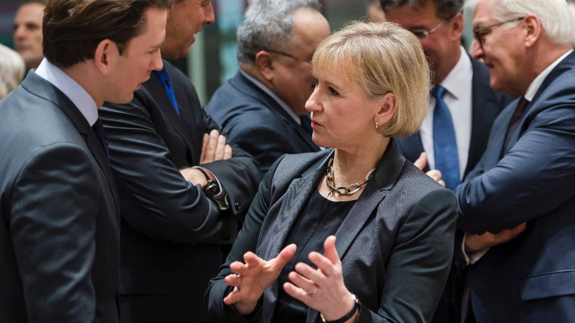 Sweden's Foreign Minister Margot Wallstrom, right, talks with Austria's Foreign Minister Sebastian Kurz during an EU foreign ministers meeting at the EU Council in Brussels on Monday, Jan. 16, 2017. (AP Photo/Geert Vanden Wijngaert)