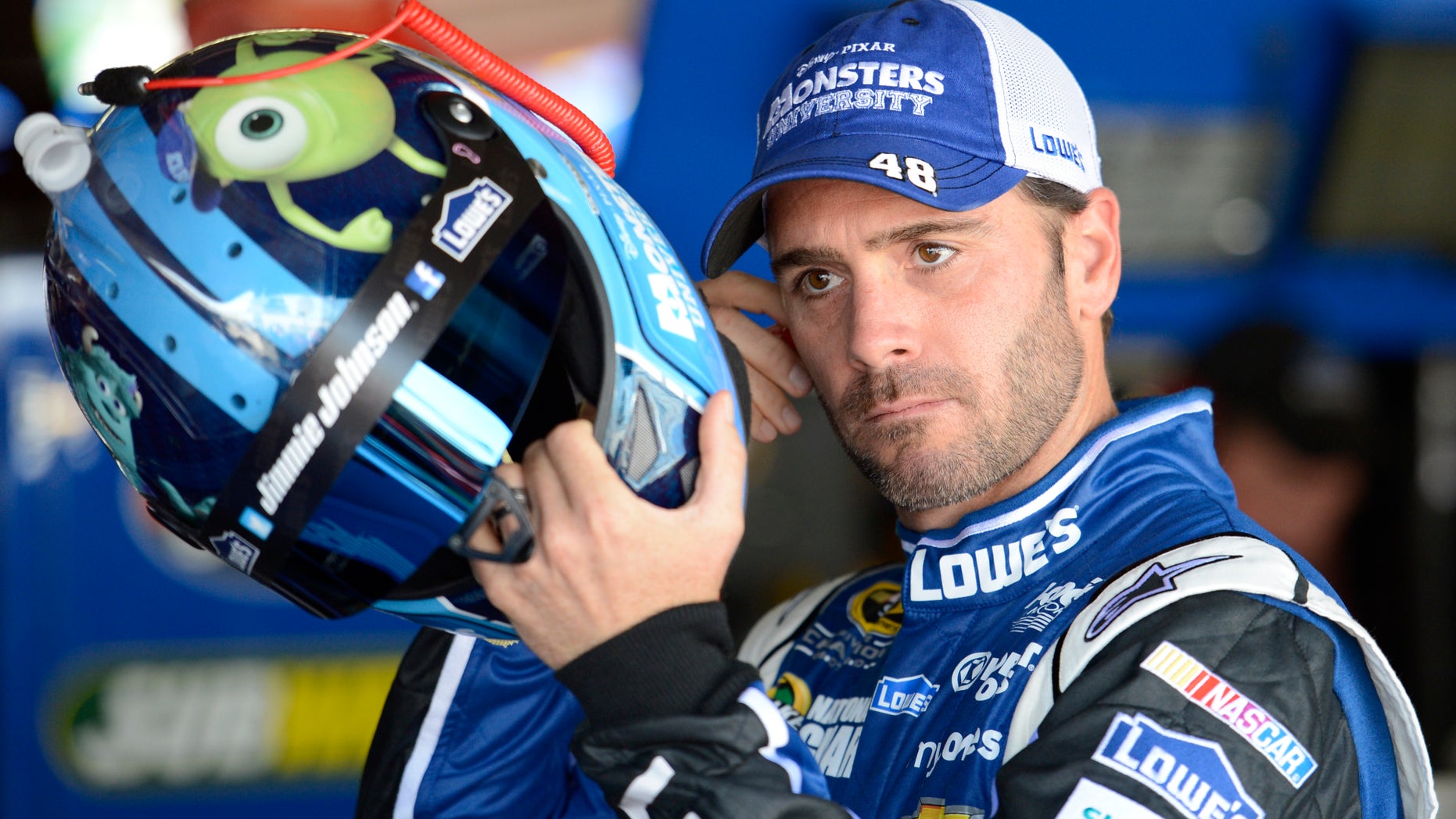 Driver Jimmie Johnson gets ready for practice for the NASCAR Sprint Cup series auto race, Friday, May 31, 2013, at Dover International Speedway in Dover, Del. (AP Photo/Nick Wass)