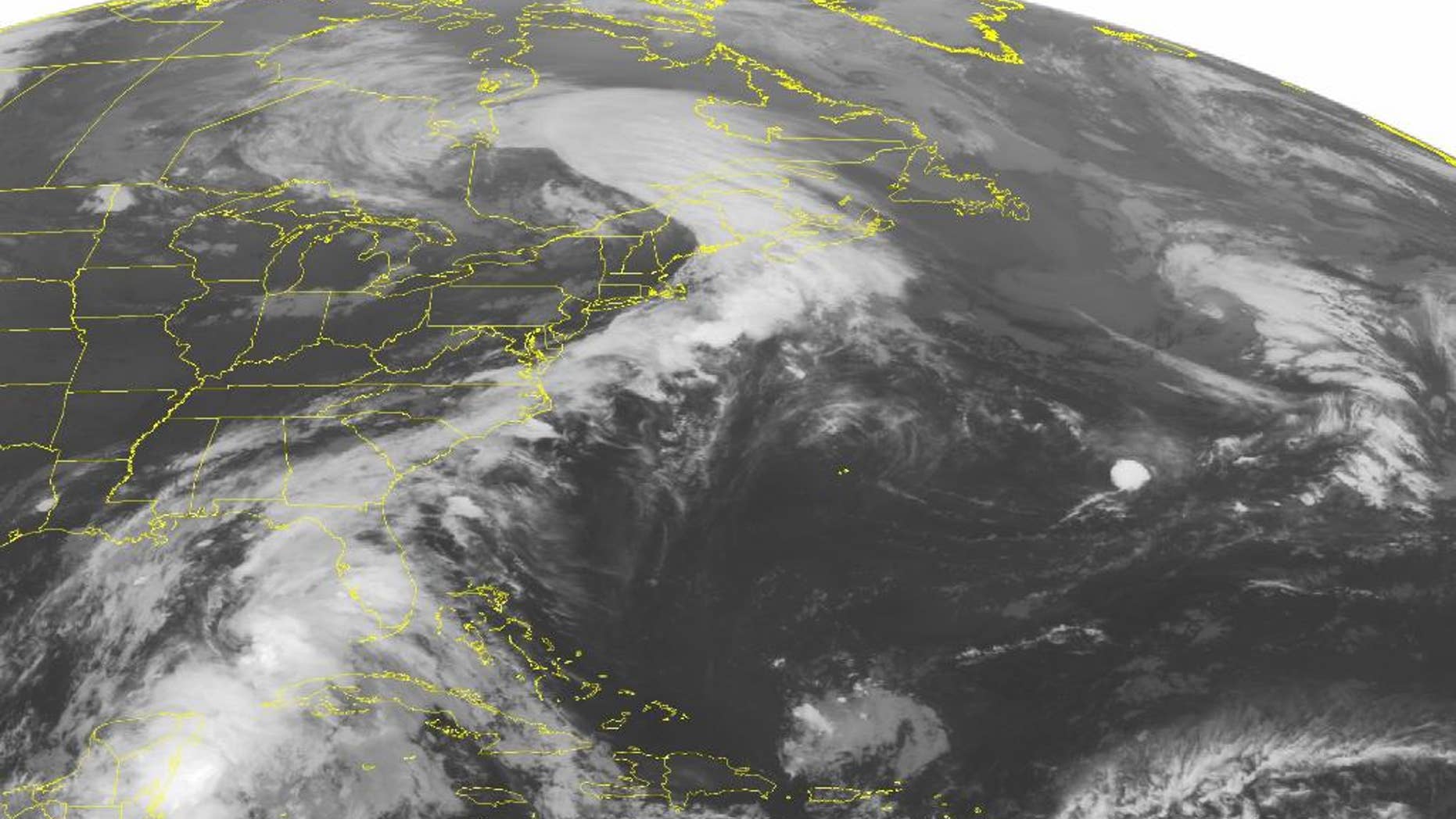 This NOAA satellite image taken Monday, June 6, 2016 at 12:45 a.m. EDT shows Tropical Storm Colin continuing to move due north over eastern portions of the Gulf of Mexico. Some of the outer rain bands have also begun moving over the western Florida shoreline as the tropical storm continues to move northward. An extended area of clouds is observed stretching from a low pressure system over southern Quebec over much of the eastern seaboard and connecting to Colin. Much of the central United States remains cloud-free with high pressure dominating. (NOAA/Weather Underground via AP)