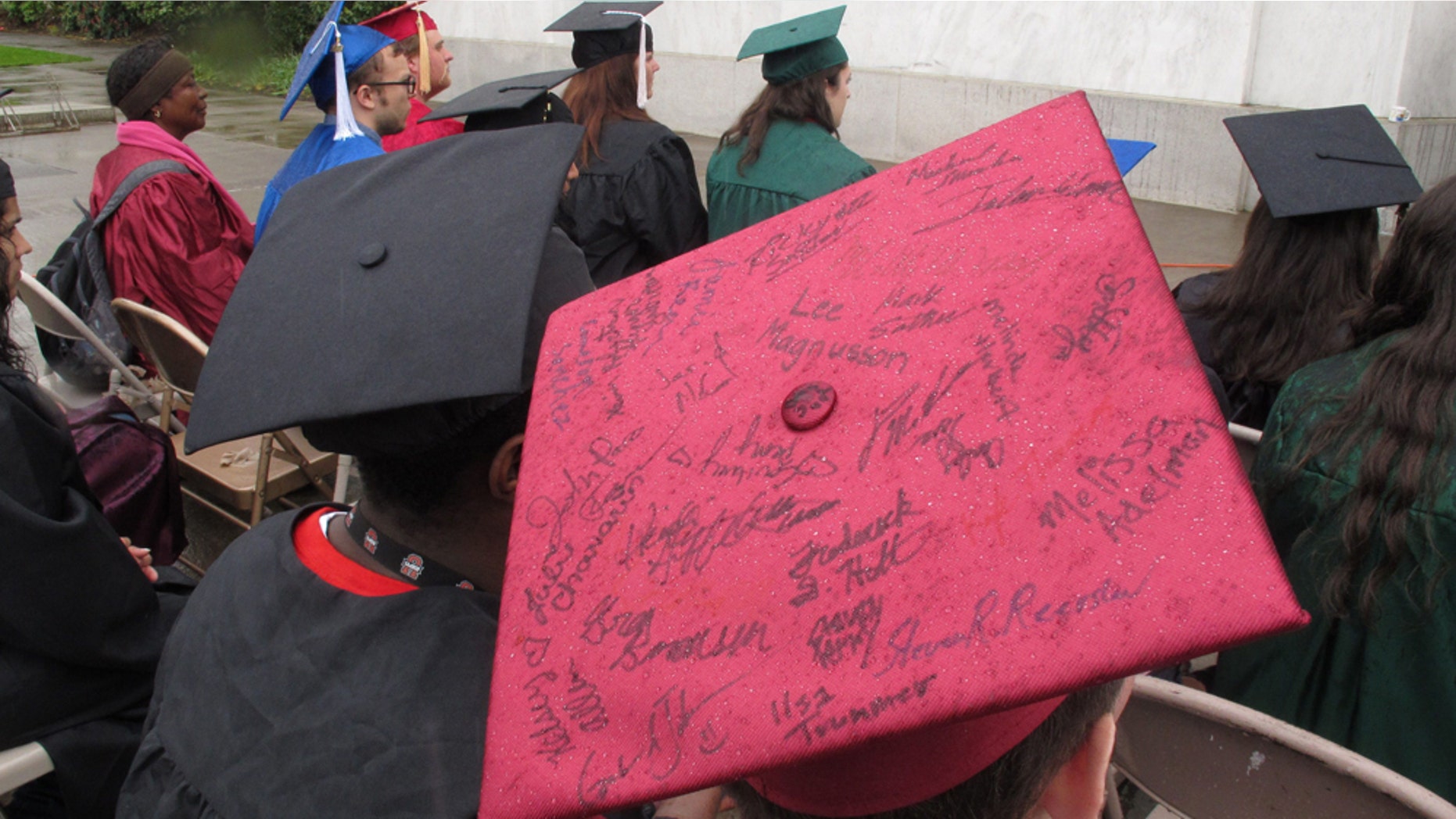 Students take part in a mock graduation ceremony at the state Capitol in Salem, Ore., on Wednesday, May 11, 2011. The ceremony was intended to promote a bill that would allow illegal immigrants to pay in-state tuition to attend Oregon universities. (AP Photo/Jonathan J. Cooper)