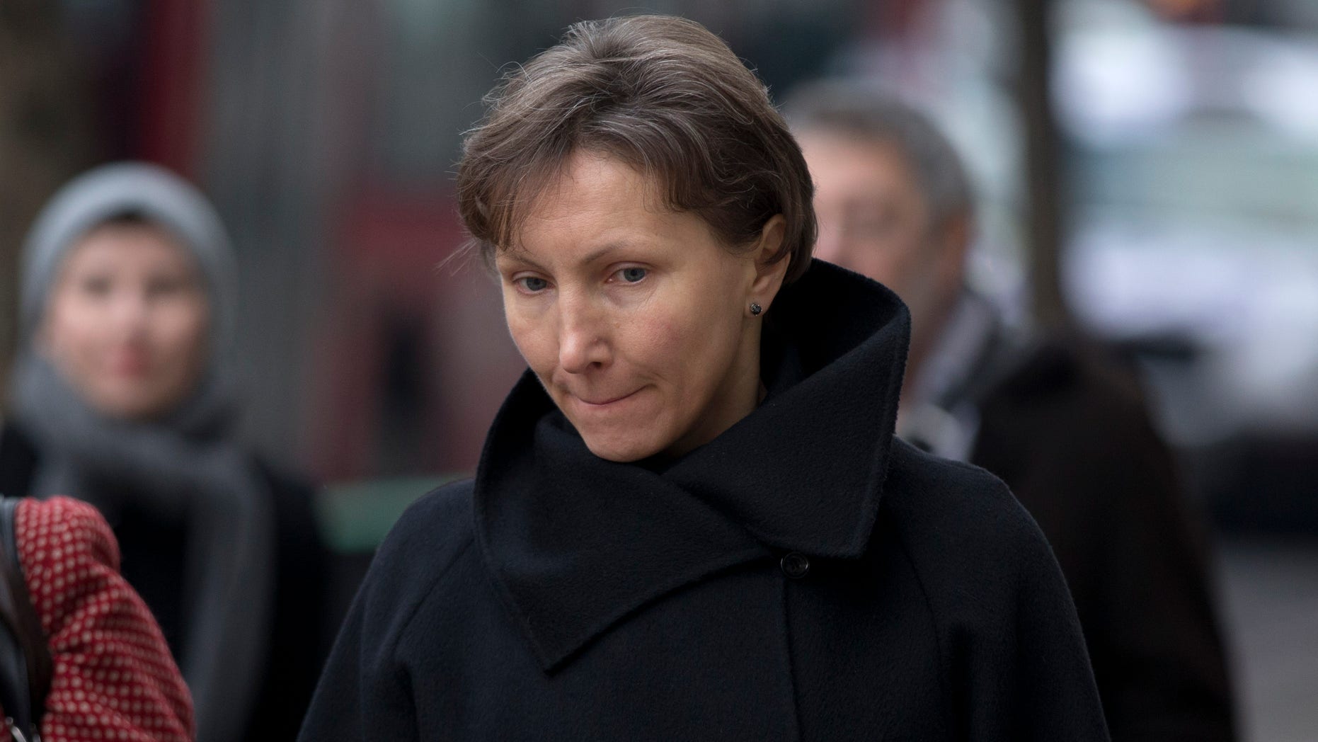 FILE - Marina Litvinenko, the widow of former Russian intelligence officer Alexander Litvinenko, arrives for the first day of a scheduled two-day Pre-Inquest Review at Camden Town Hall in London, in this Thursday, Dec. 13, 2012 file photo. British media organizations are challenging a government secrecy bid for parts of the inquest into the death of a former Russian intelligence agent poisoned in London. Alexander Litvinenko died in a London hospital in 2006, with the rare radioactive substance polonium-210 being found in his body. (AP Photo/Matt Dunham, file)