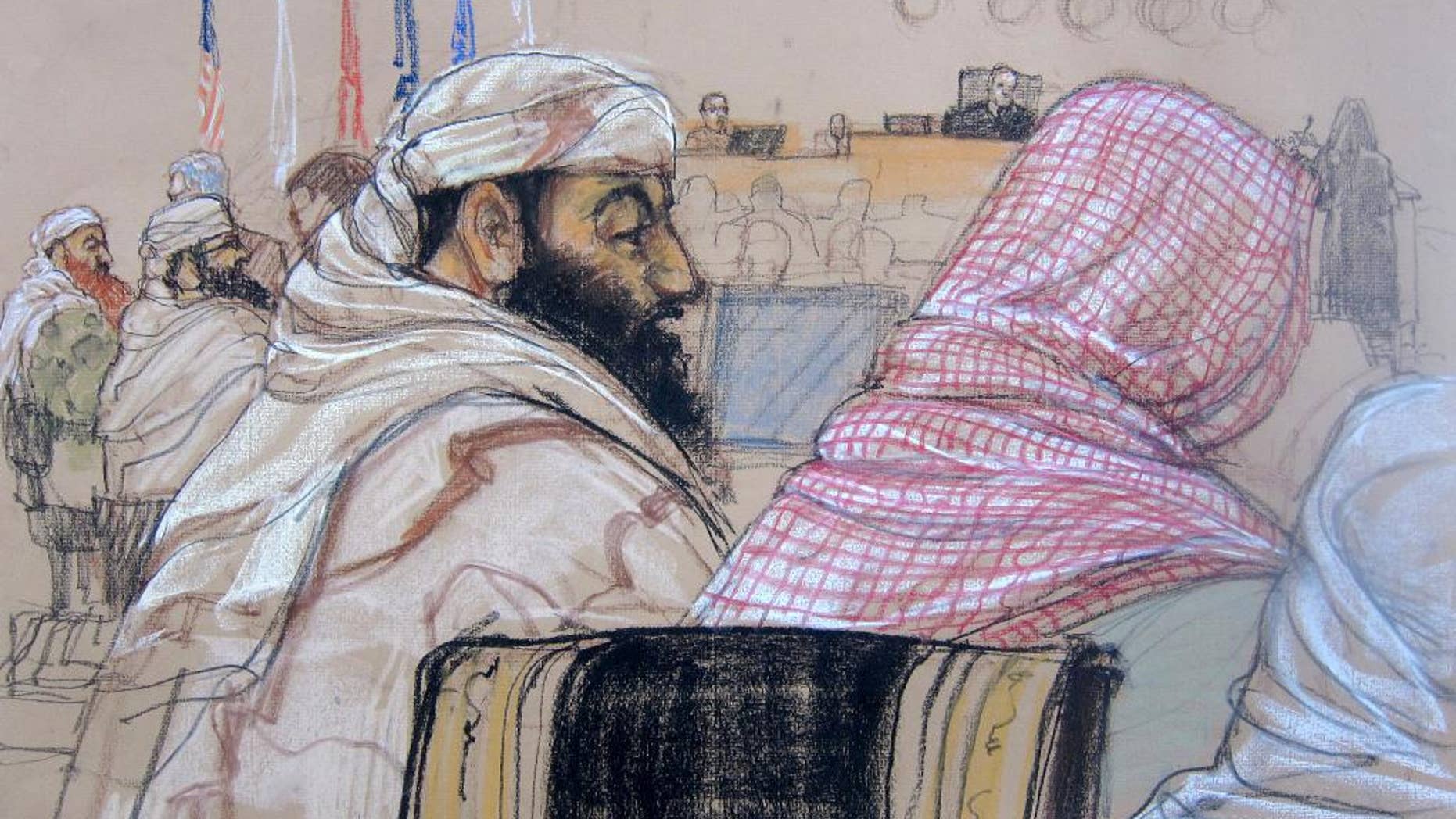 In this pool photo of a Pentagon-approved sketch by court artist Janet Hamlin, defendant Ramzi Binalshibh, center, attends his pretrial hearing along with other defendants at the Guantanamo Bay U.S. Naval Base in Cuba, Monday, April 14, 2014. From right to left are Mustafa al Hawsawi, partially cut off, Ali Abdul Aziz Ali, Ramzi Binalshibh, Walid bin Attash and Khalid Sheikh Mohammad. A lawyer for one of five defendants in the Sept. 11 war crimes tribunal said Monday that FBI agents questioned a member of his defense team, apparently in an investigation related to the handling of evidence, a revelation that brought an abrupt halt to proceedings. The disclosure came at the start of what was supposed to be a mental competency hearing for Harrington's client, Ramzi Binalshibh, a Yemeni accused of providing logistical support to the Sept. 11, 2001, terrorist plot. (AP Photo/Janet Hamlin, Pool)
