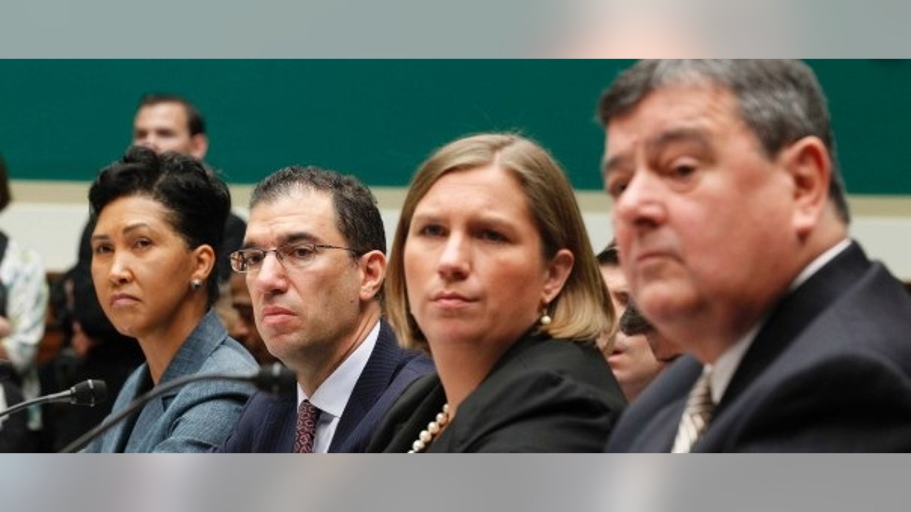 Cheryl Campbell, Senior Vice President of CGI Federal; Andrew Slavitt, Executive Vice President for Optum/QSSI; Lynn Spellecy, corporate counsel for Equifax Workforce Solutions and John Lau, program director for Serco are pictured at a House Energy and Commerce Committee hearing on the Patient Protection and Affordable Care Act on Capitol Hill in Washington, Oct. 24, 2013. (REUTERS/Jason Reed)