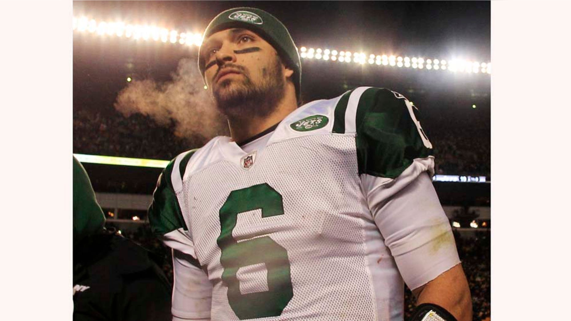 New York Jets quarterback Mark Sanchez walks off the field after a 24-19 loss to the Pittsburgh Steelers in the AFC Championship NFL football game in Pittsburgh, Sunday, Jan. 23, 2011. The Steelers advance to the Super Bowl to play the Green Bay Packers. (AP Photo/Charles Krupa)