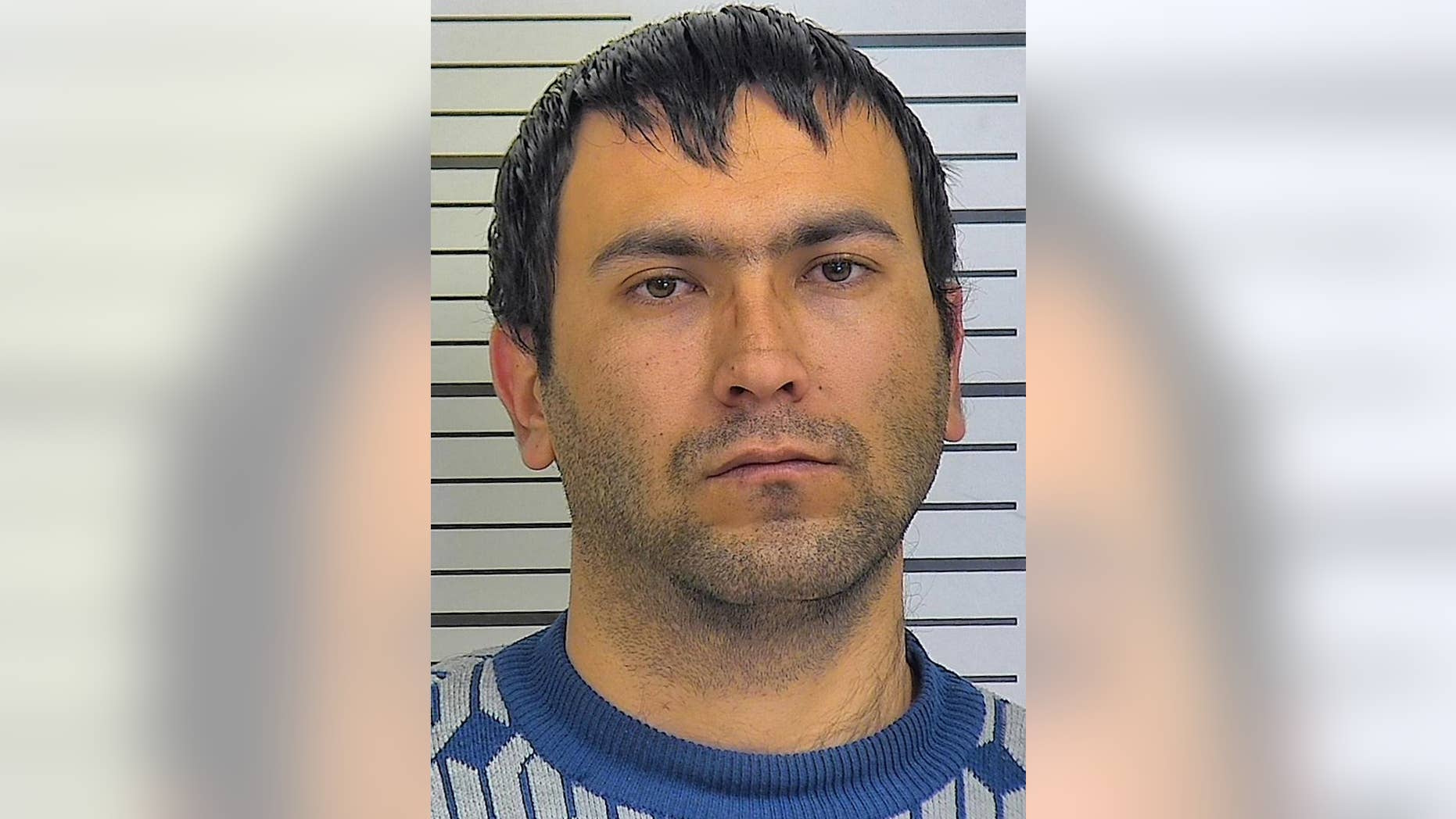 This undated photo provided by the Platte County Missouri Sheriff's Department shows Khurshed Haydarov. Haydarov a trucker whose hours-long standoff at a Missouri rest stop snarled a freeway's traffic for miles heading into the holiday weekend remained jailed Wednesday, Dec. 28, 2016. Platte County prosecutors charged Haydarov with making a terrorist threat with what turned out to be a pellet gun. (Platte County Missouri Sheriff's Department via AP)