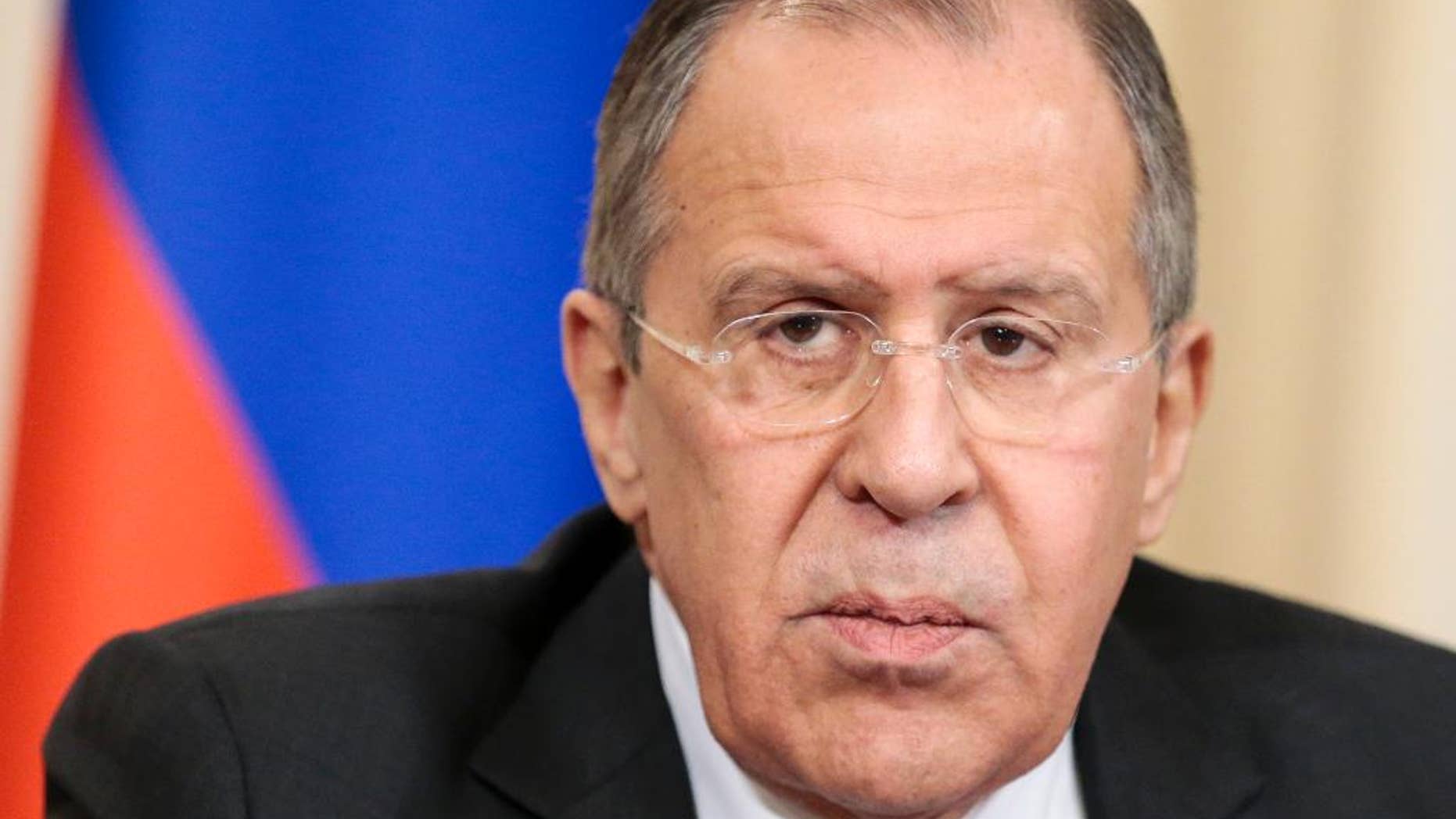 Russian Foreign Minister Sergey Lavrov listens for a question during a shared news conference with High Representative of the European Union for Foreign Affairs Federica Mogherini following their talks n Moscow, Russia, Monday, April 24, 2017. Lavrov has vowed to use Moscow's influence to get Ukraine's separatist rebels to comply with a cease-fire deal. (AP Photo/Ivan Sekretarev)