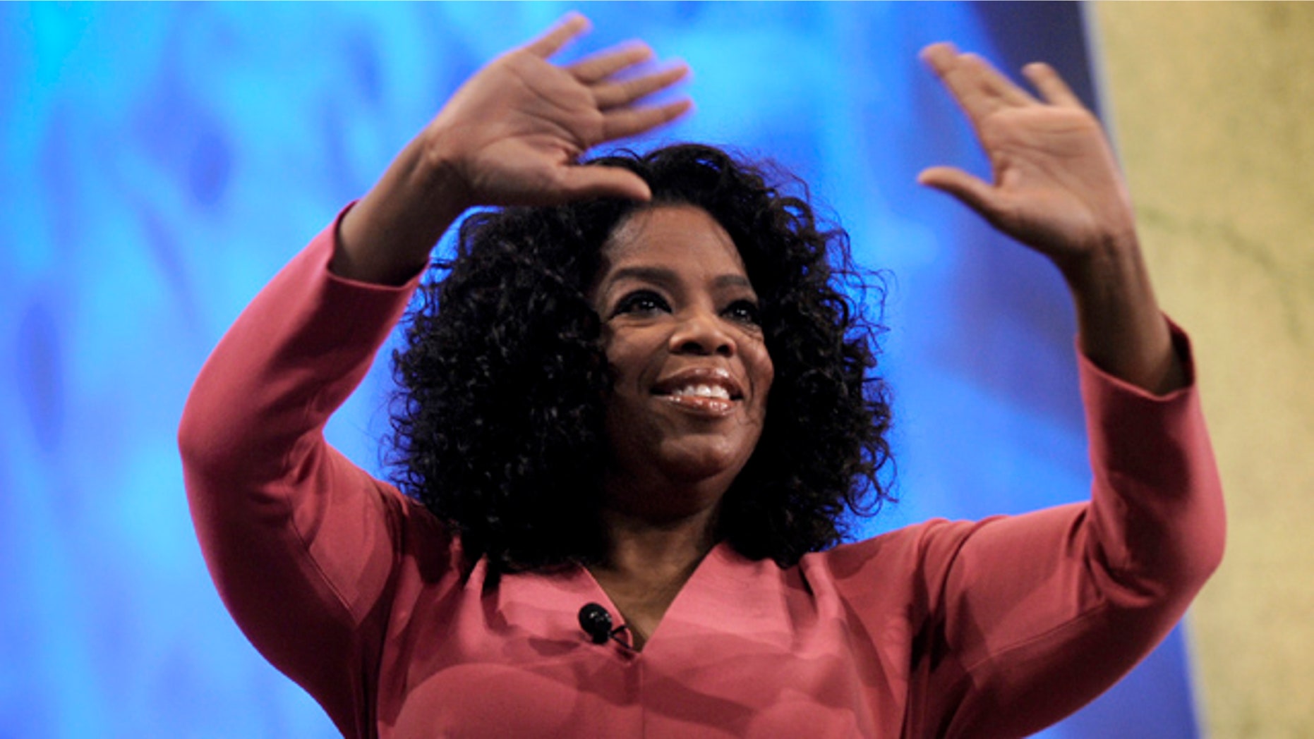 June 16: Oprah Winfrey greets the crowd before talking with Paula Zahn during the National Cable & Telecommunications Association's Cable Show 2011 at McCormick Place in Chicago.