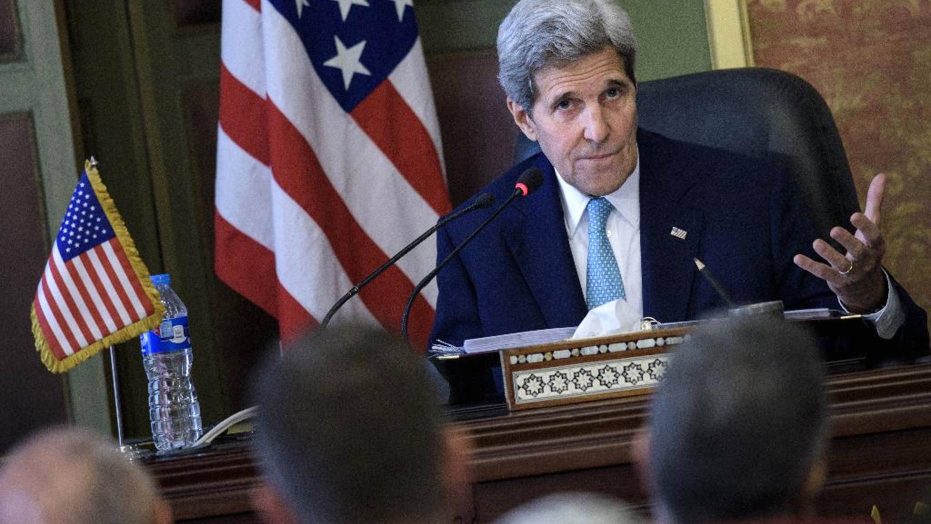 U.S. Secretary of State John Kerry speaks during a press conference with his Egyptian counterpart Sameh Shoukry after their meeting at the foreign ministry in Cairo, Egypt, Sunday, Aug. 2, 2015. The United States and Egypt on Sunday resumed formal security talks that were last held six years ago and kept on hiatus until now amid the political unrest that swept the country in the wake of the Arab Spring. (Brendan Smialowski/Pool Photo via AP)