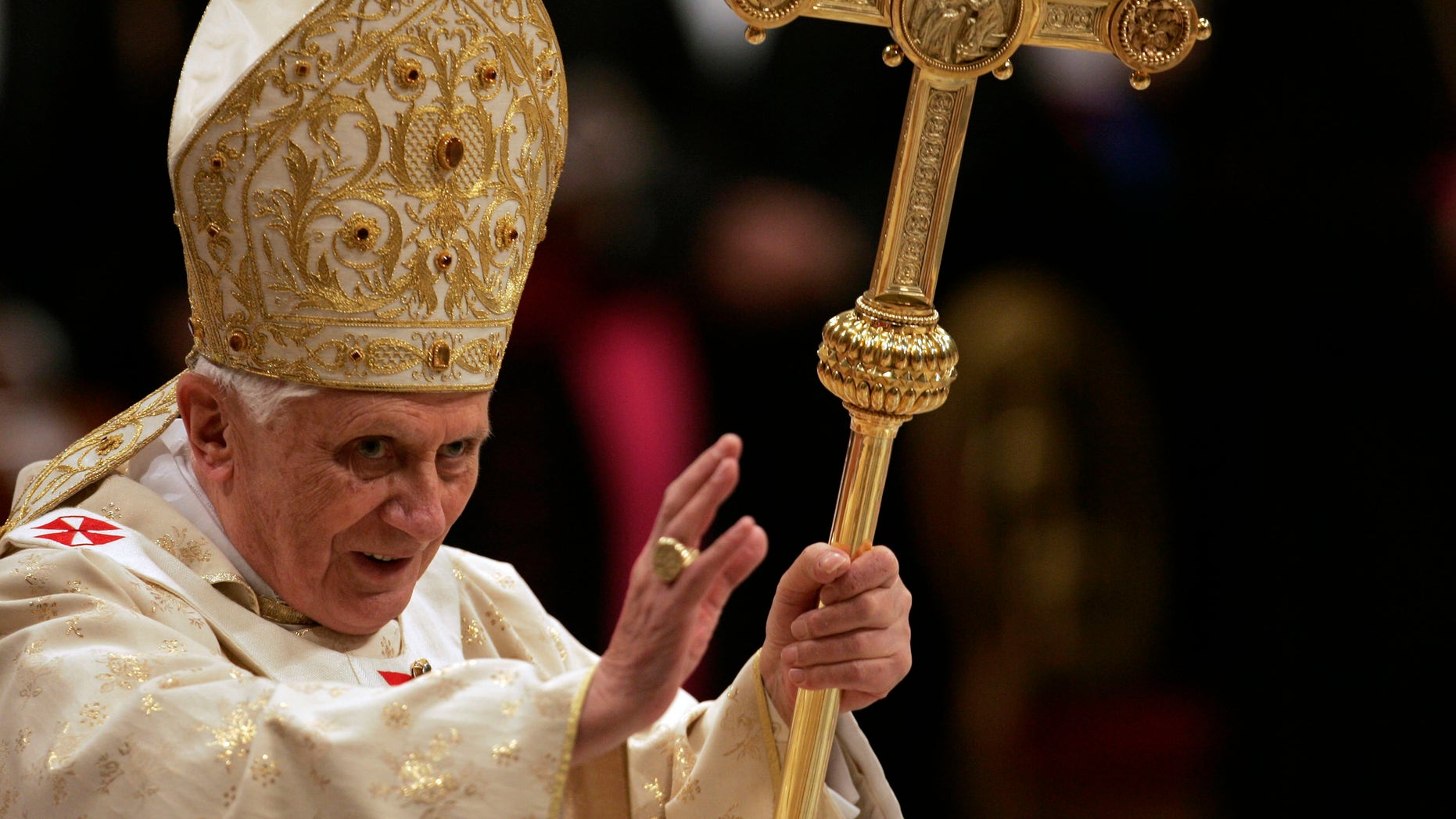 FILE - In this Thursday, Dec. 25, 2008, file photo, Pope Benedict XVI holds the pastoral staff as he celebrates Christmas midnight Mass in St. Peter's Basilica at the Vatican. Declaring that he lacks the strength to do his job, Benedict announced Monday Feb. 11, 2013, he will resign Feb. 28 _ becoming the first pontiff to step down in 600 years. His decision sets the stage for a mid-March conclave to elect a new leader for a Roman Catholic Church in deep turmoil. (AP Photo/Gregorio Borgia, File)