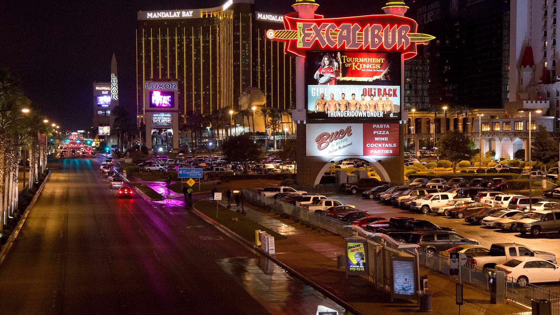 The marquee for the Excalibur hotel-casino is seen along Las Vegas Boulevard, Friday, Dec. 14, 2012, in Las Vegas. At around 8:30 p.m., a man shot a woman, who was a vendor at the hotel's concierge desk, and then turned the gun on himself. The man was found dead at the scene. The woman was transported to a local hospital, where she was pronounced dead. (AP Photo/Julie Jacobson)
