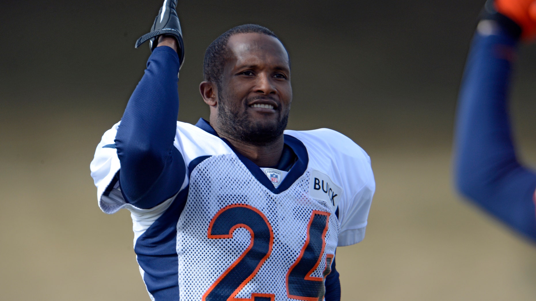 Denver Broncos cornerback Champ Bailey gestures during the NFL football team's practice Tuesday, Jan. 8, 2013, in Englewood, Colo. The Broncos play the Baltimore Ravens at home on Saturday in a playoff game. (AP Photo/The Denver Post, John Leyba) MAGS OUT TV OUT