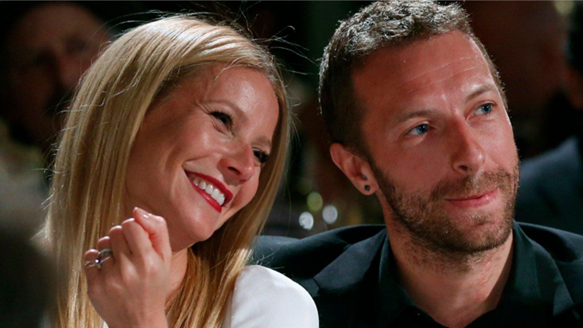 Jan. 11, 2014. Gwyneth Paltrow, left, and her husband, singer Chris Martin at the 3rd Annual Sean Penn & Friends Help Haiti Home Gala in Beverly Hills, Calif.