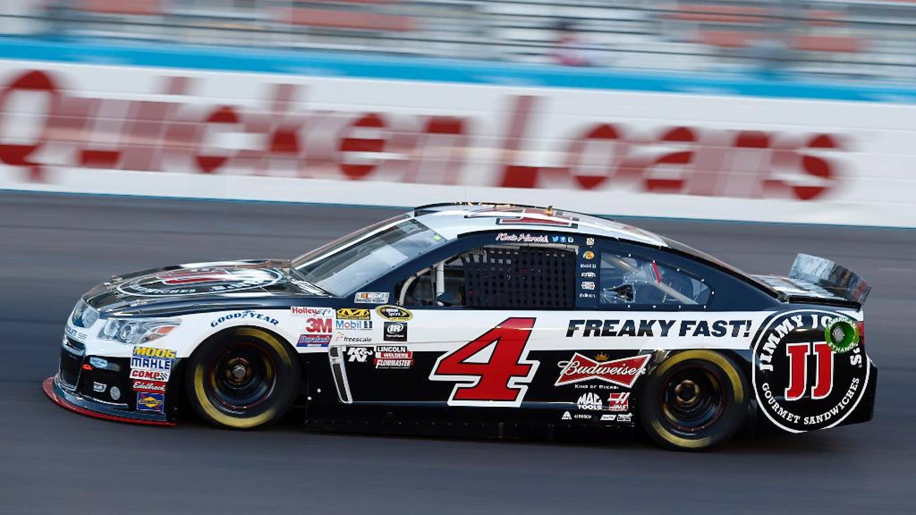 Kevin Harvick drives during qualifying for Sunday's NASCAR Sprint Cup Series auto race, Friday, March 13, 2015, in Avondale, Ariz. Harvick won the pole. (AP Photo/Rick Scuteri)