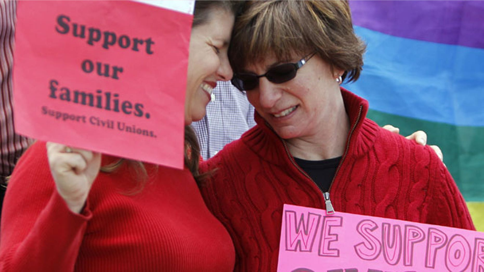 May 8, 2012: Partners Anna Simon, left, and Fran Simon embrace at a rally in support of Civil Unions at the Capitol in Denver.