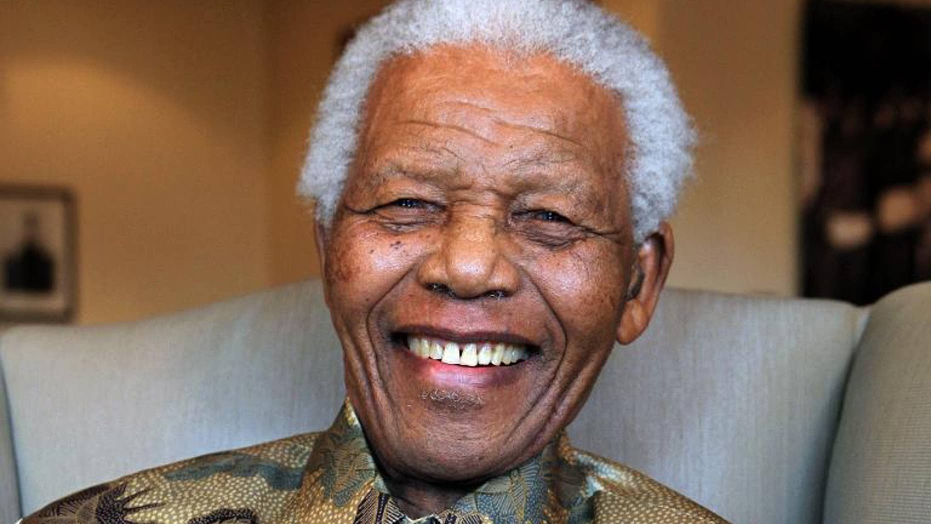 A photo taken on August 25, 2010 shows former South Africa's President Nelson Mandela in this handout photograph released by the Nelson Mandela Foundation