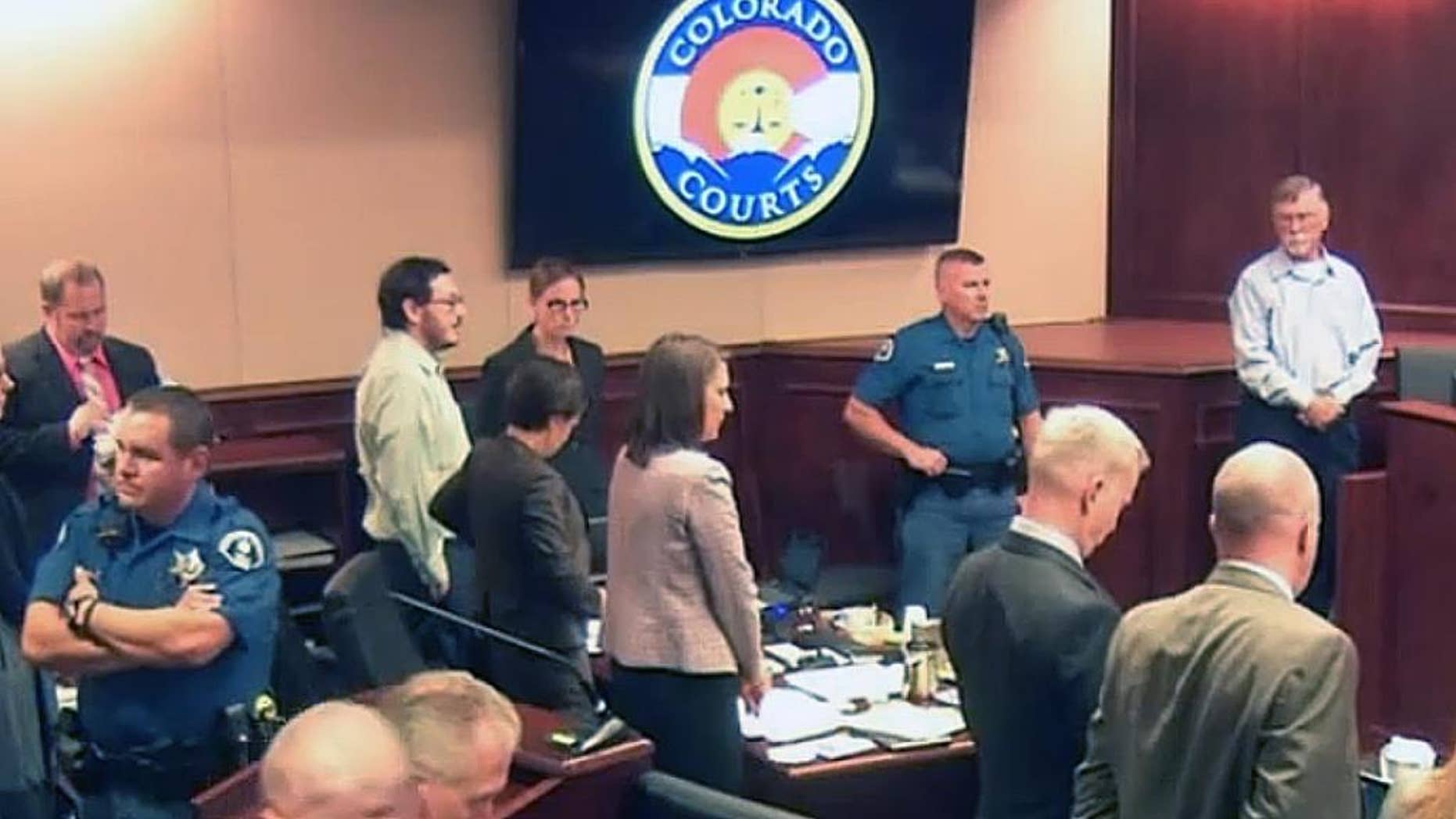 FILE - This file photo released on Sept. 20, 2012 by the Arapahoe County Sheriff's Office shows Colorado movie theater shooter James Holmes. While on the stand on July 28 and 29, 2015, Robert Holmes testified that his son came home from winter break from graduate school in 2011, several months before the shooting, and was making odd facial expressions which his parents had not seen in him before. (AP Photo/Arapahoe County Sheriff via AP)