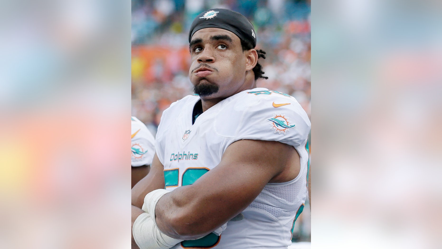 Miami Dolphins defensive end Olivier Vernon watches during the final seconds of an NFL football game against the Buffalo Bills, Sunday, Oct. 20, 2013, in Miami Gardens, Fla. The Bills defeated the Dolphins 23-21. (AP Photo/Wilfredo Lee)