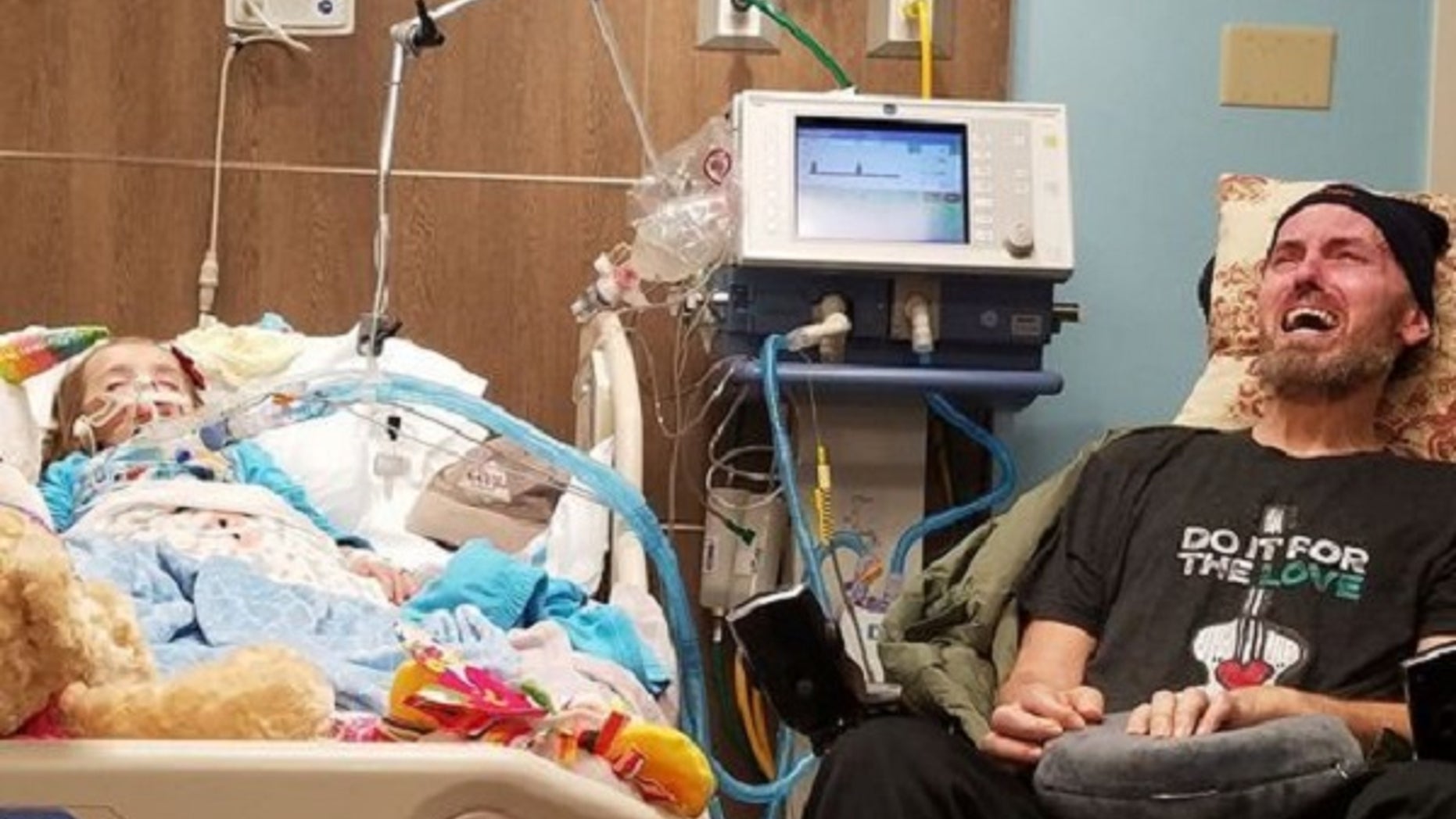 Braylynn Lawhon, 5, who has brain cancer, is seen next to her grandfather, who suffers from ALS.