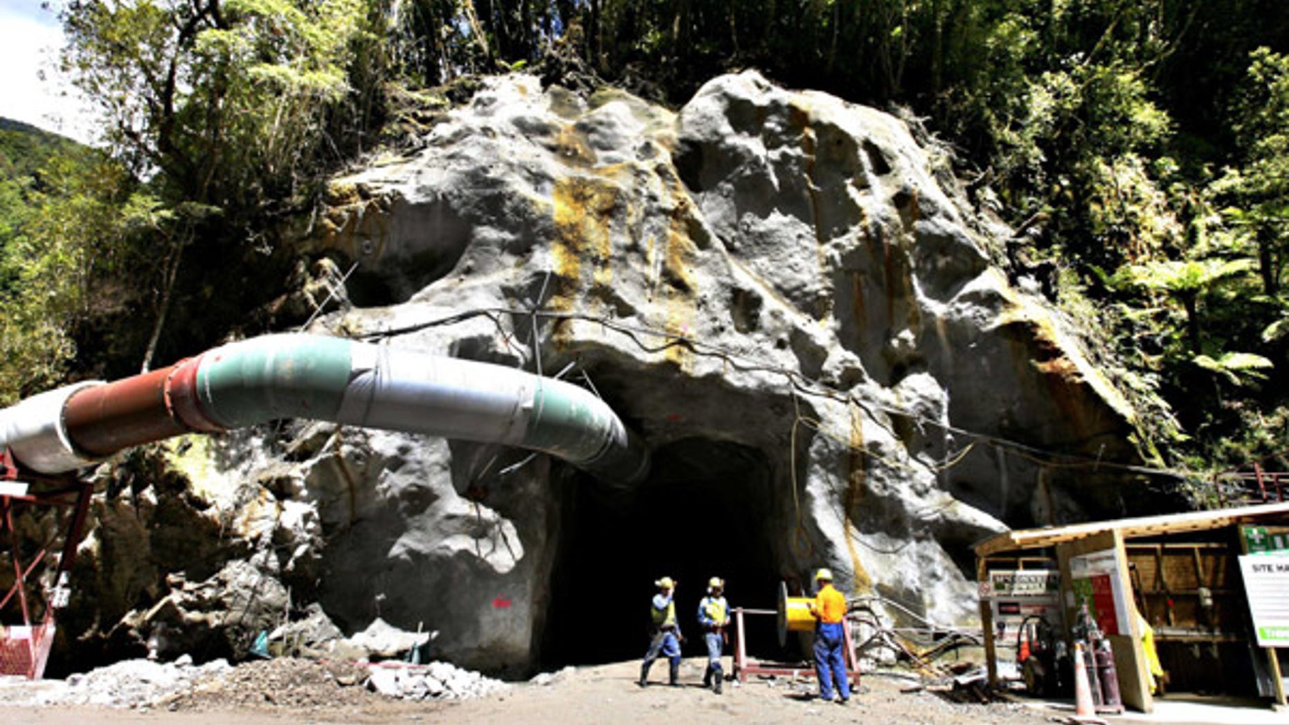 File: Men work near the Pike River Coal Mine portal in Atarau, New Zealand.