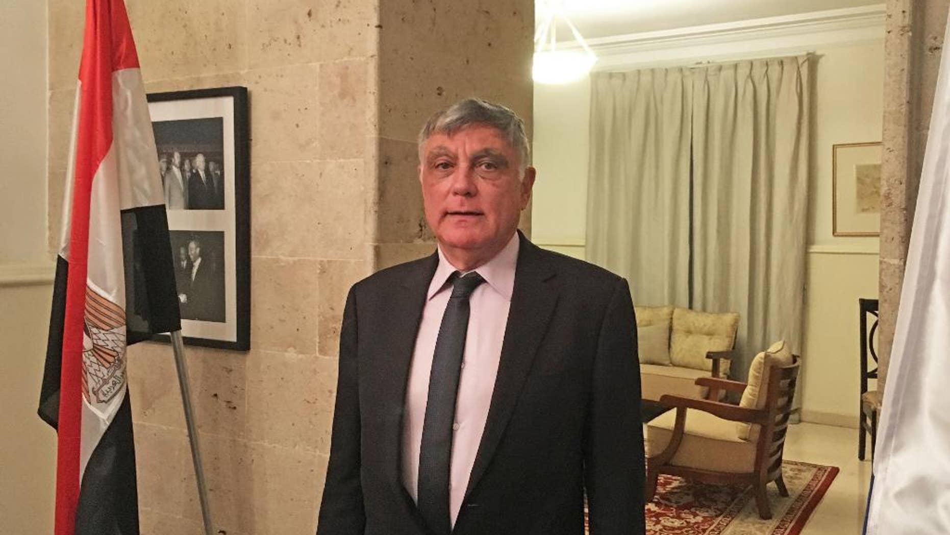 In this Tuesday, June 21, 2016 photo, Israel's Ambassador to Egypt, Haim Koren, stands inside the residence at the Embassy compound in the Cairo suburb of Maadi, where he has been posted since 2014. After decades of wars followed by years of uneasy peace, Israel has emerged as a discrete but key ally to Egypt’s President Abdel-Fattah el-Sissi, who along with powerhouse Saudi Arabia and the Emirates has sought to define friend and foe together in the region during troubled times. (AP Photo/Brian Rohan)