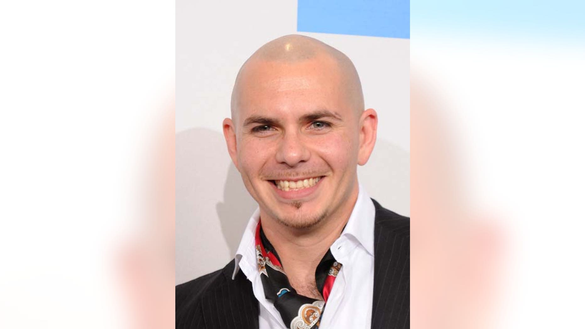 LOS ANGELES, CA - NOVEMBER 21: Singer Pitbull poses in the press room during the 2010 American Music Awards held at Nokia Theatre L.A. Live on November 21, 2010 in Los Angeles, California. (Photo by Jason Merritt/Getty Images for DCP)