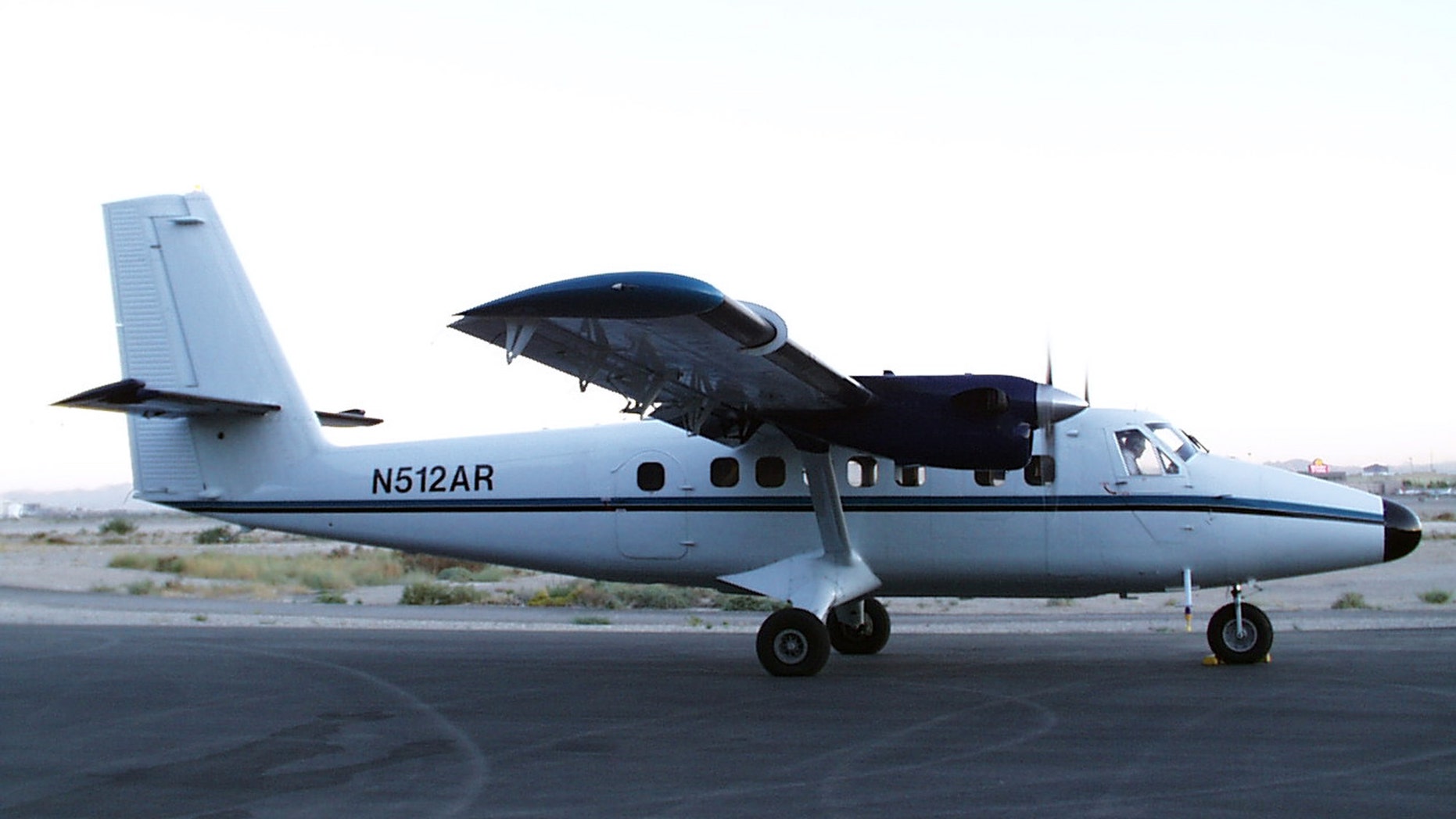 FILE - This Aug. 10, 2007 file photo provided by NOAA shows a DeHavilland DHC6 Twin Otter similar to the one belonging to Nepal Airlines that was missing in Nepal’s mountainous west Sunday, Feb. 16, 2014. A Nepal Airlines plane with 18 people on board flying in bad weather was missing and feared to have crashed, officials said. The plane left Sunday from the resort town of Pokhara after making an unscheduled fuel stop, but contact was lost a few minutes later, said Civil Aviation Authority of Nepal official Ram Hari Sharma. (AP Photo/NOAA, File)
