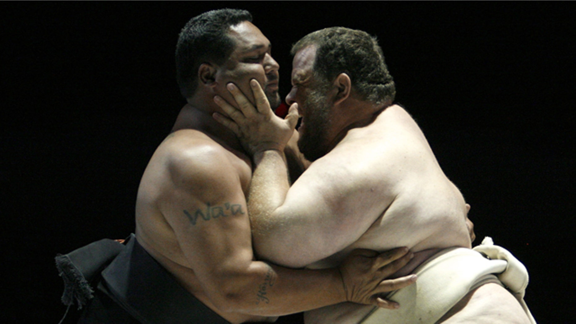 April 8, 2007: Harry Wa'a of U.S. clashes with compatriot Kelly Gneiting at U.S. Sumo Open in Los Angeles.