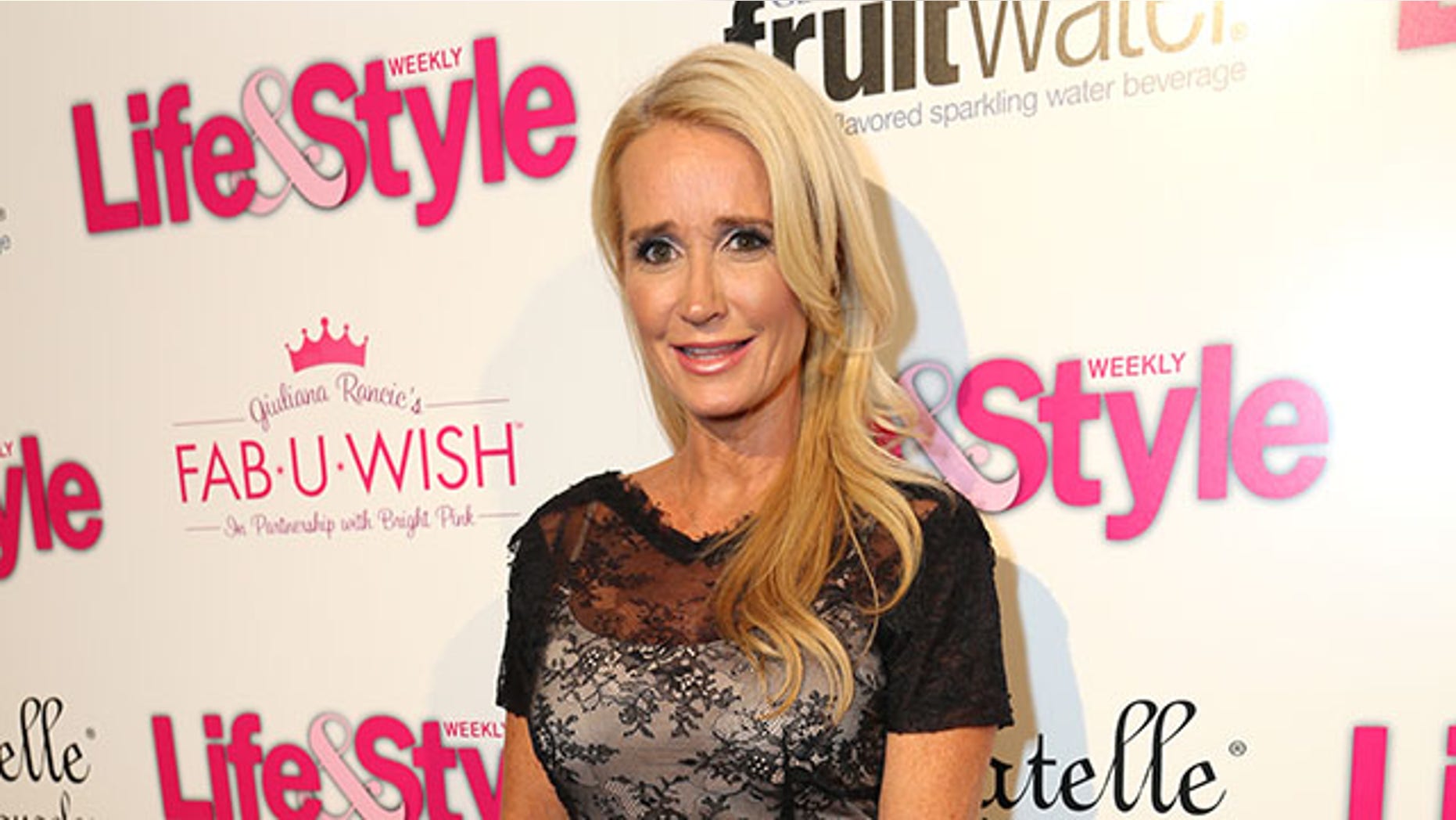 LOS ANGELES, CA - OCTOBER 09: TV personality Kim Richards attends Hollywood in Bright Pink presented by Life & Style, hosted by Giuliana Rancic at Bagatelle on October 9, 2013 in Los Angeles, California. (Photo by Rachel Murray/Getty Images for Life & Style)