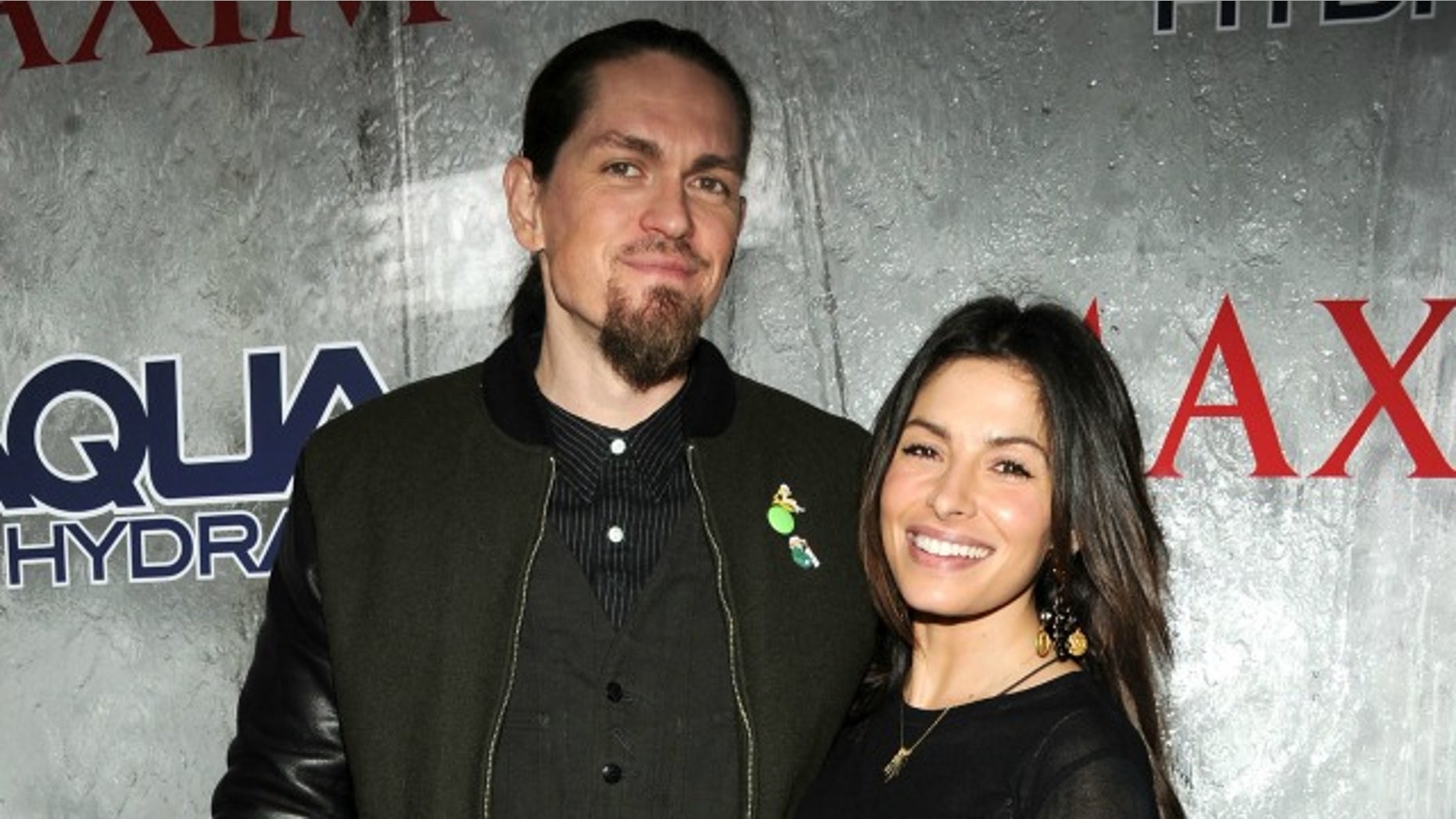 Steve Howey and wife Sarah Shahi.